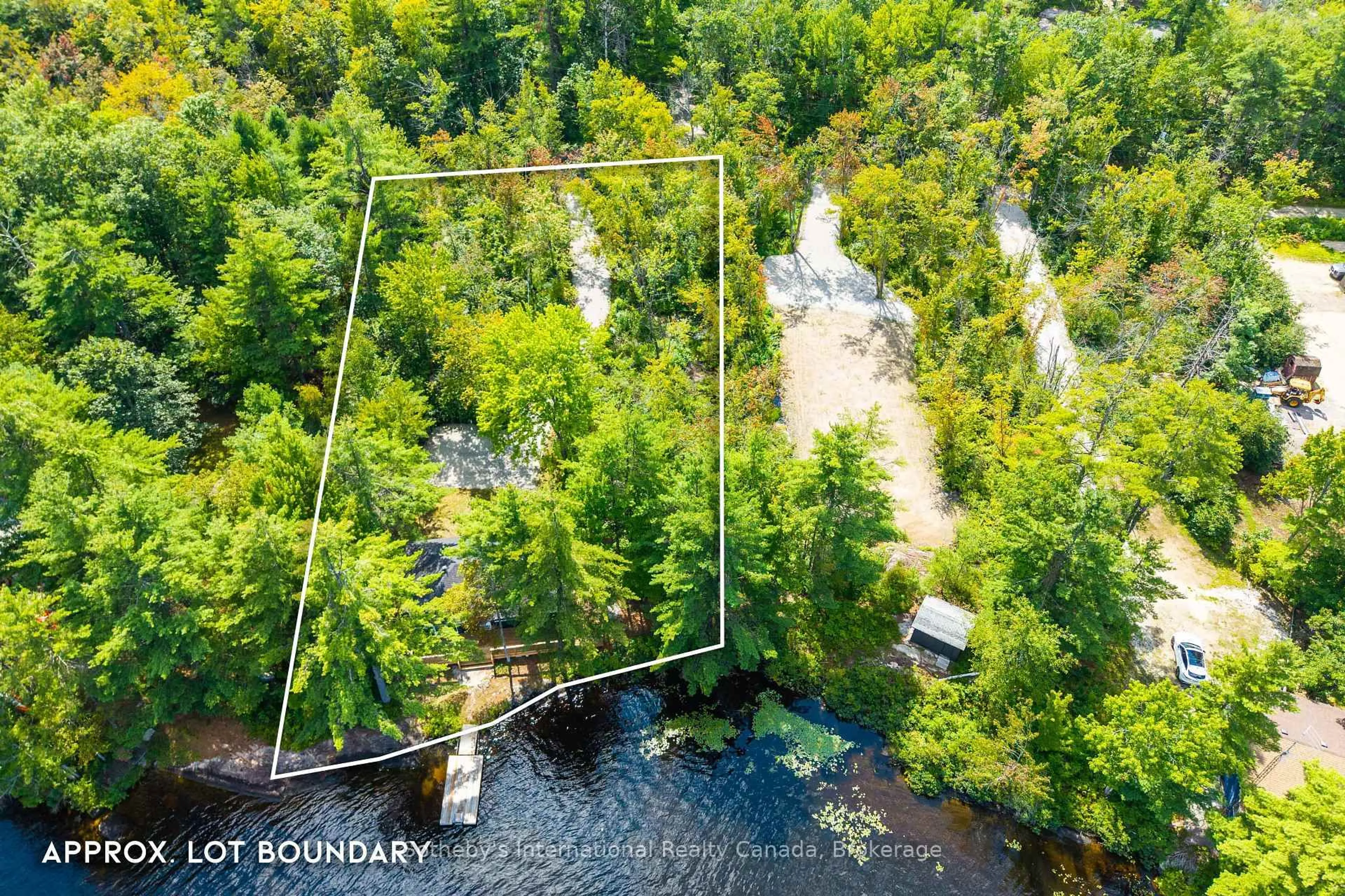 A pic from outside/outdoor area/front of a property/back of a property/a pic from drone, water/lake/river/ocean view for 1055 West Bank Dr #COTTAGE, Gravenhurst Ontario P0E 1G0