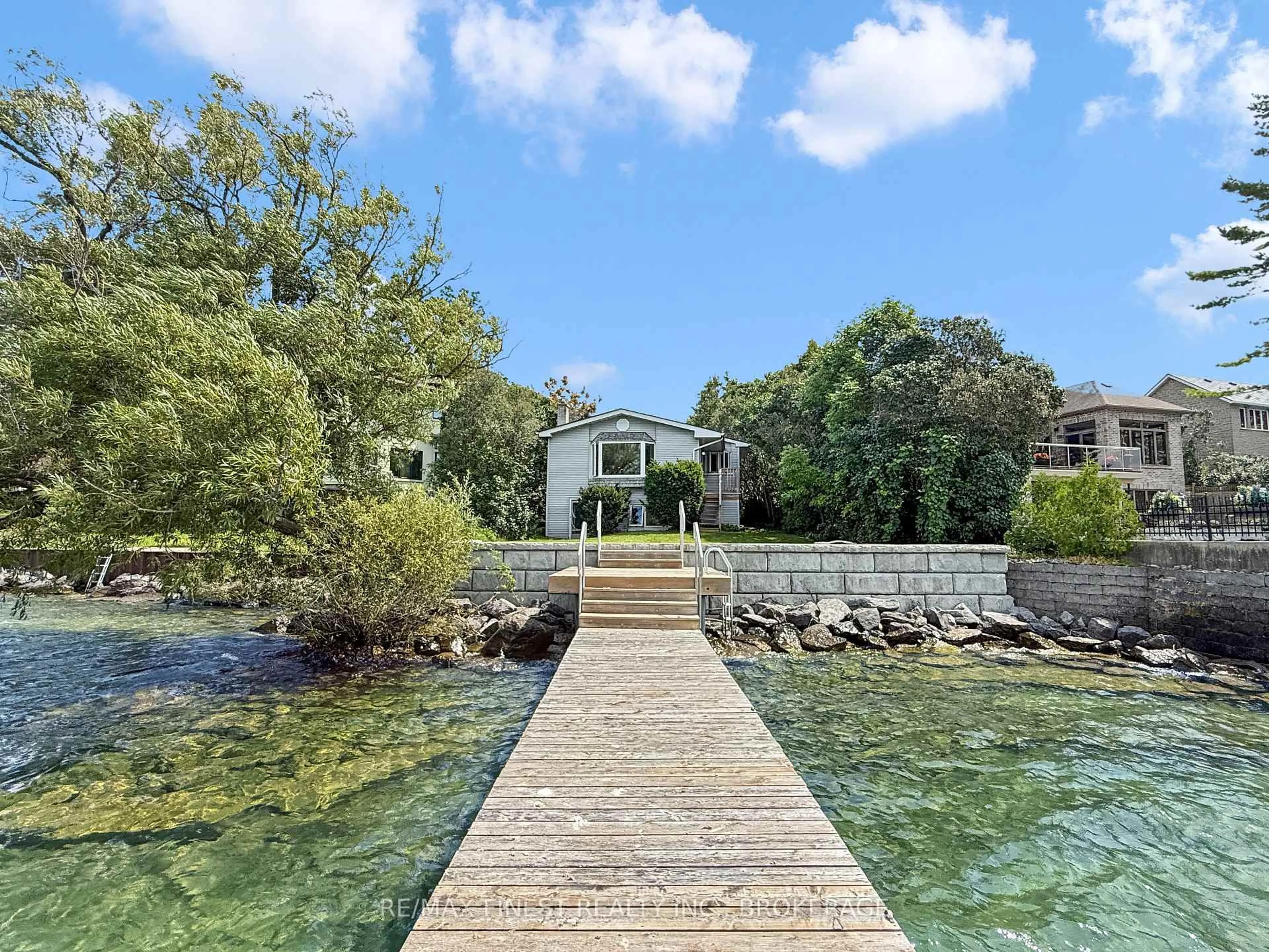 A pic from outside/outdoor area/front of a property/back of a property/a pic from drone, water/lake/river/ocean view for 9 Point Cres, Kingston Ontario K7M 3P2