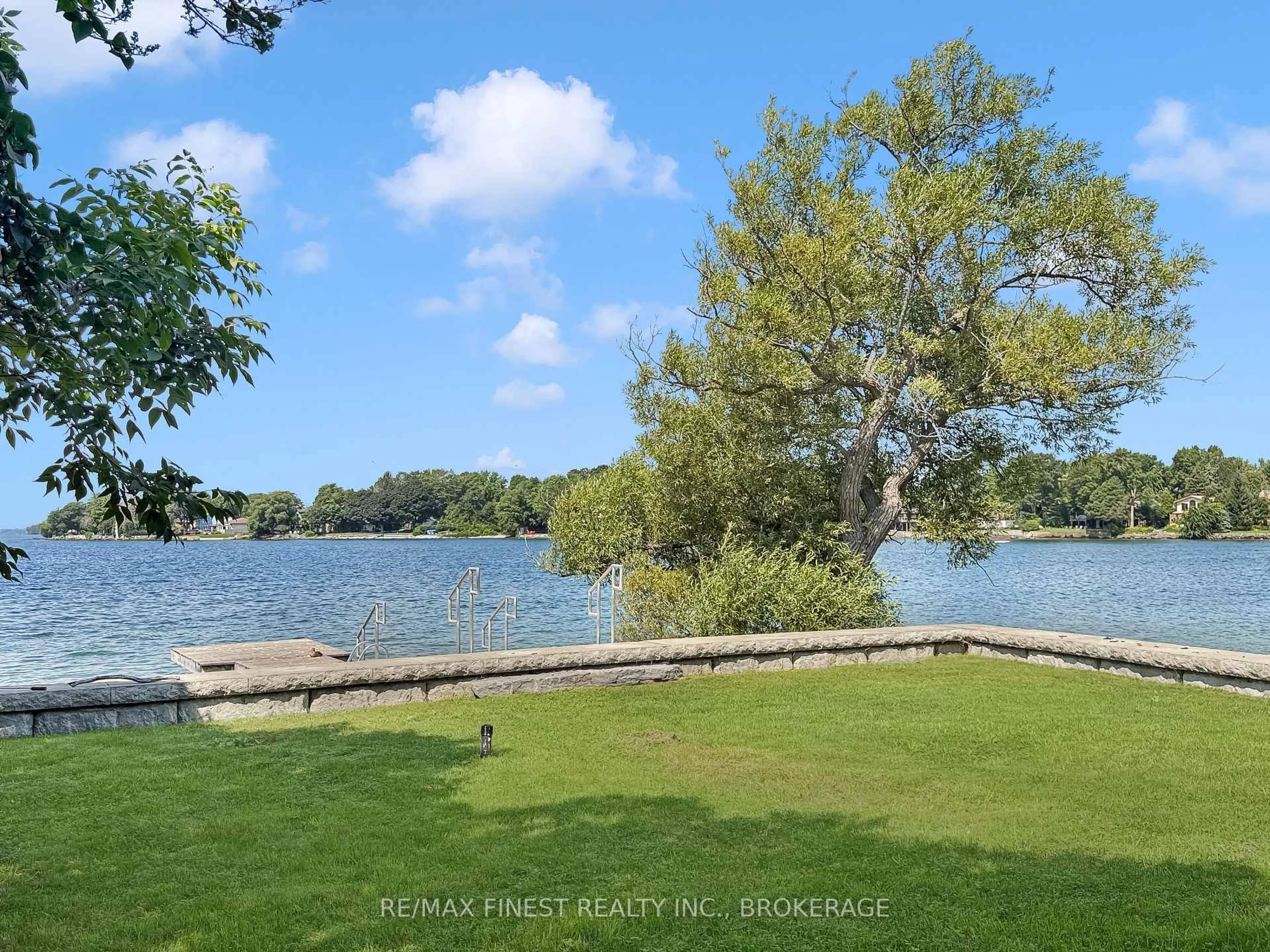 A pic from outside/outdoor area/front of a property/back of a property/a pic from drone, water/lake/river/ocean view for 9 Point Cres, Kingston Ontario K7M 3P2