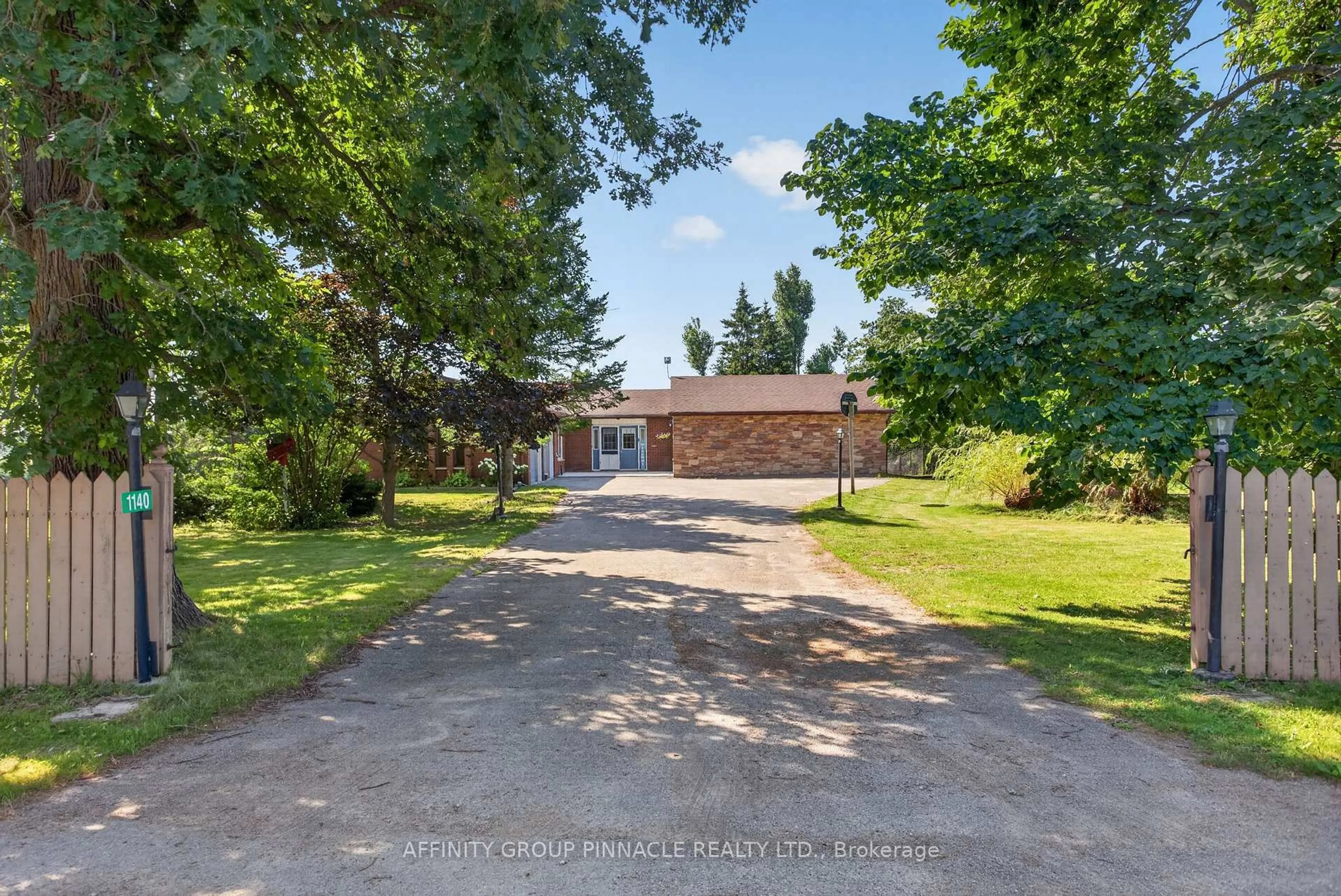 A pic from outside/outdoor area/front of a property/back of a property/a pic from drone, street for 1140 Farmstead Rd, Kawartha Lakes Ontario K0M 2M0