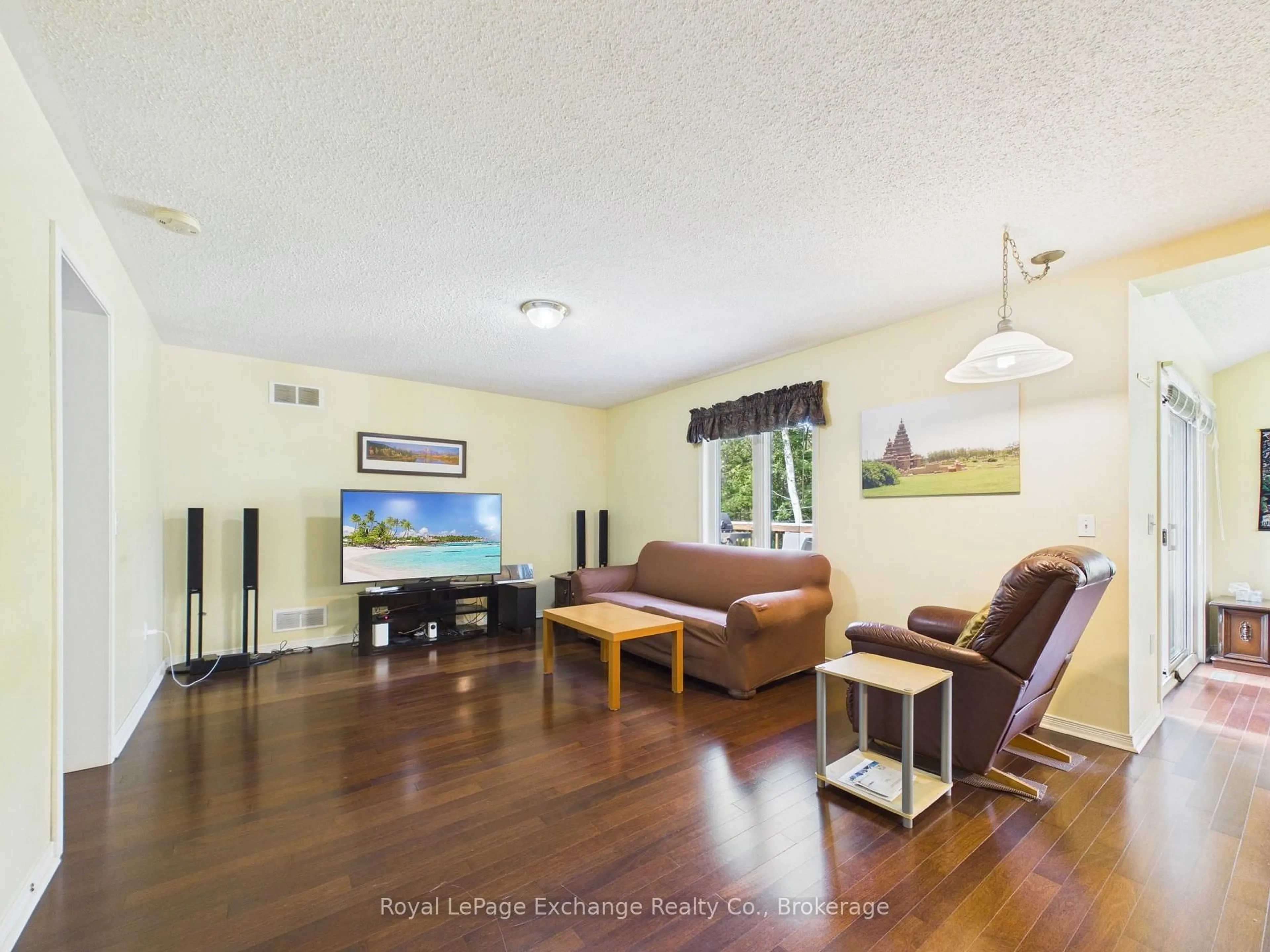 Living room with furniture, wood/laminate floor for 377 Lake Range Dr, Huron-Kinloss Ontario N0G 2R0