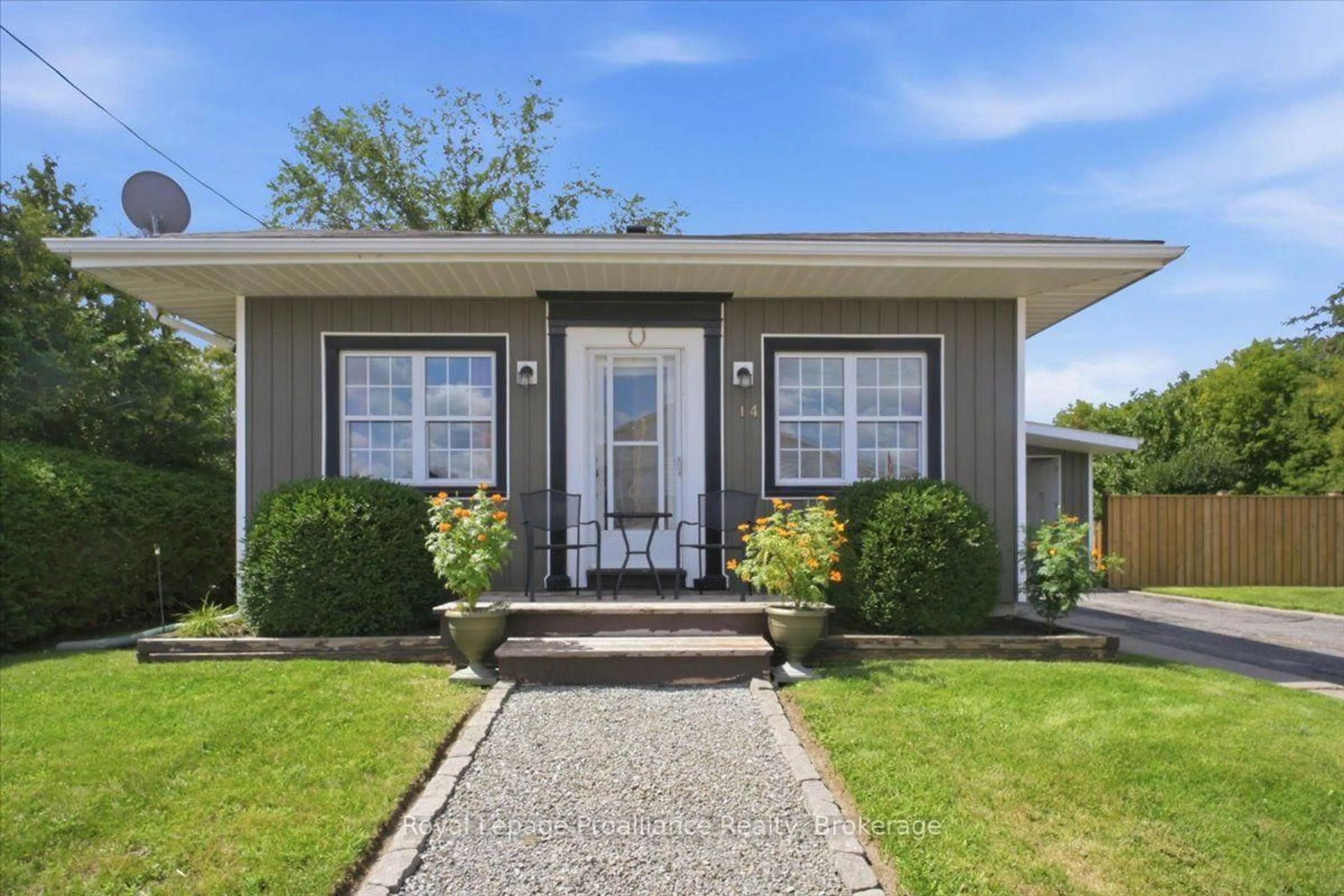 Home with vinyl exterior material, street for 14 Victoria St, Tweed Ontario K0K 3J0