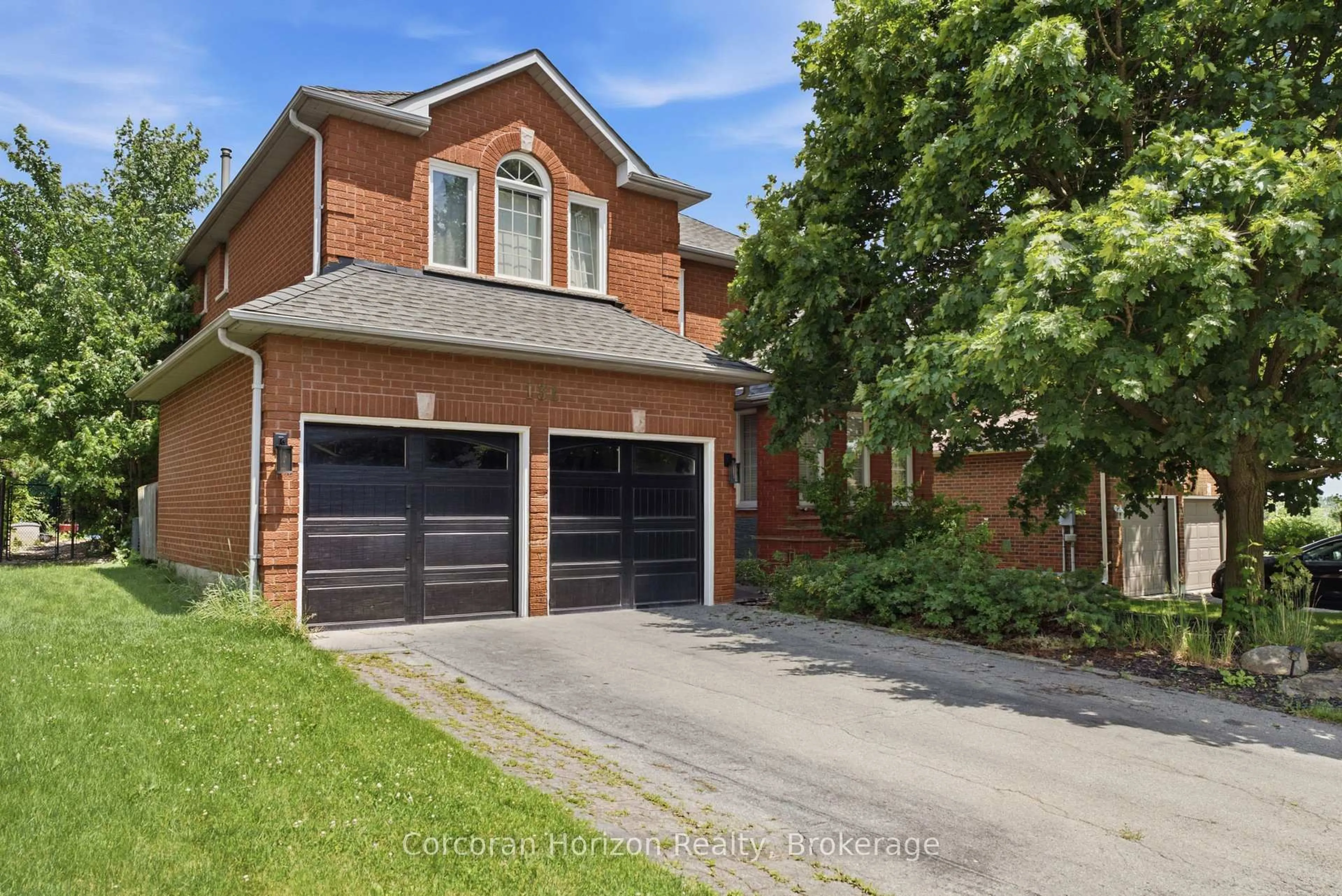 Home with brick exterior material, street for 131 Huntingwood Ave, Hamilton Ontario L9H 6X5