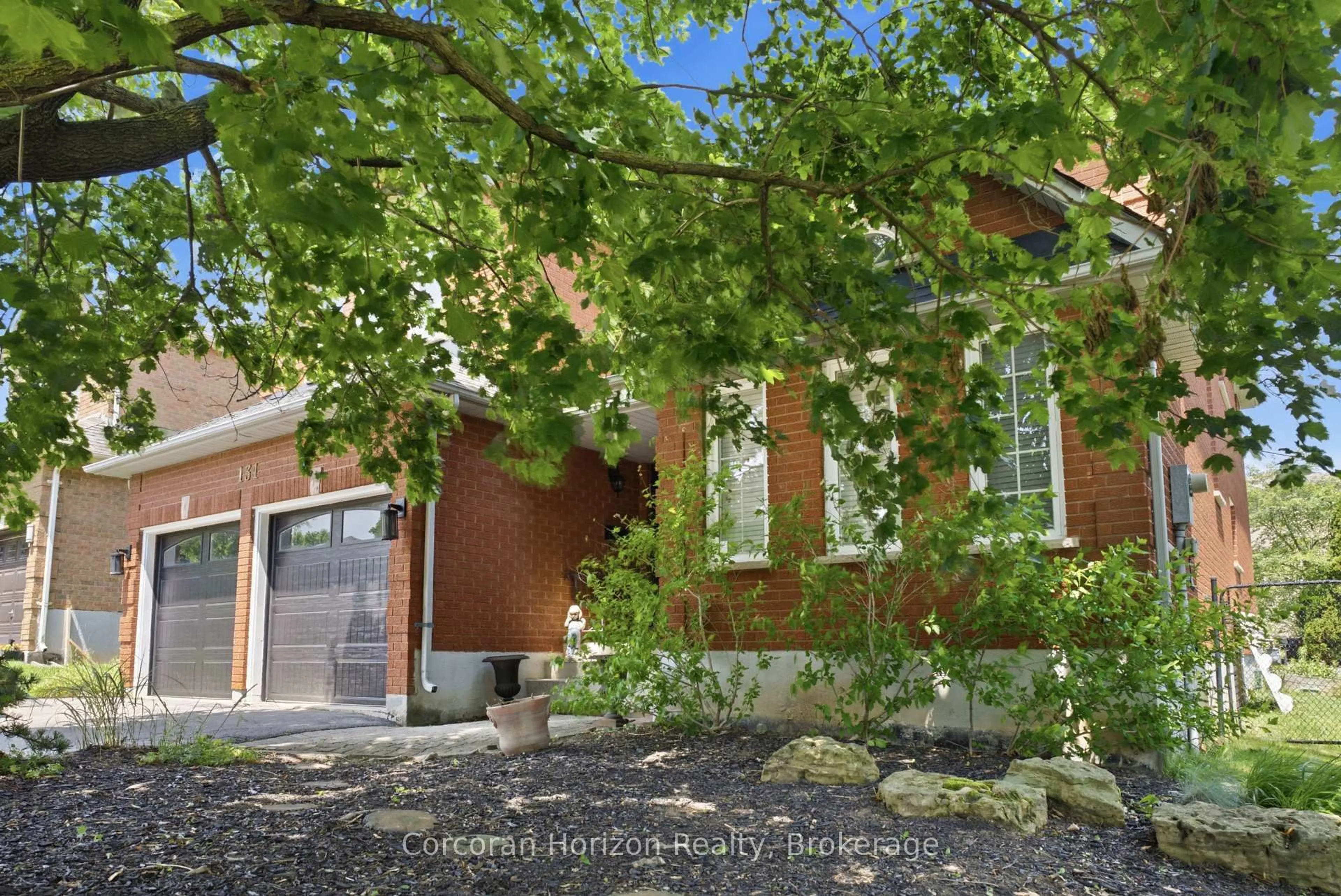 Home with brick exterior material, street for 131 Huntingwood Ave, Hamilton Ontario L9H 6X5