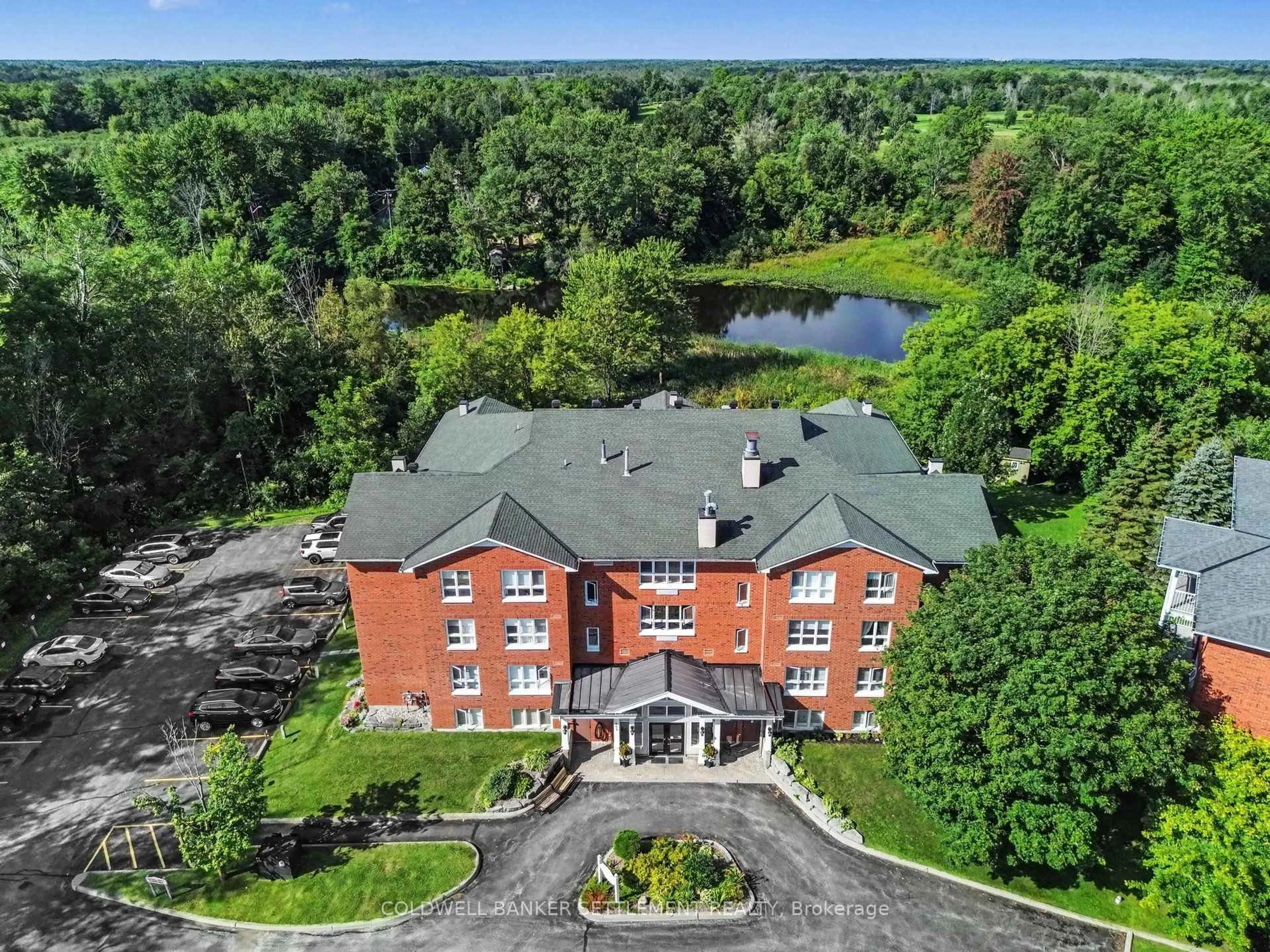 A pic from outside/outdoor area/front of a property/back of a property/a pic from drone, water/lake/river/ocean view for 103 North St #301, Perth Ontario K7H 3P3