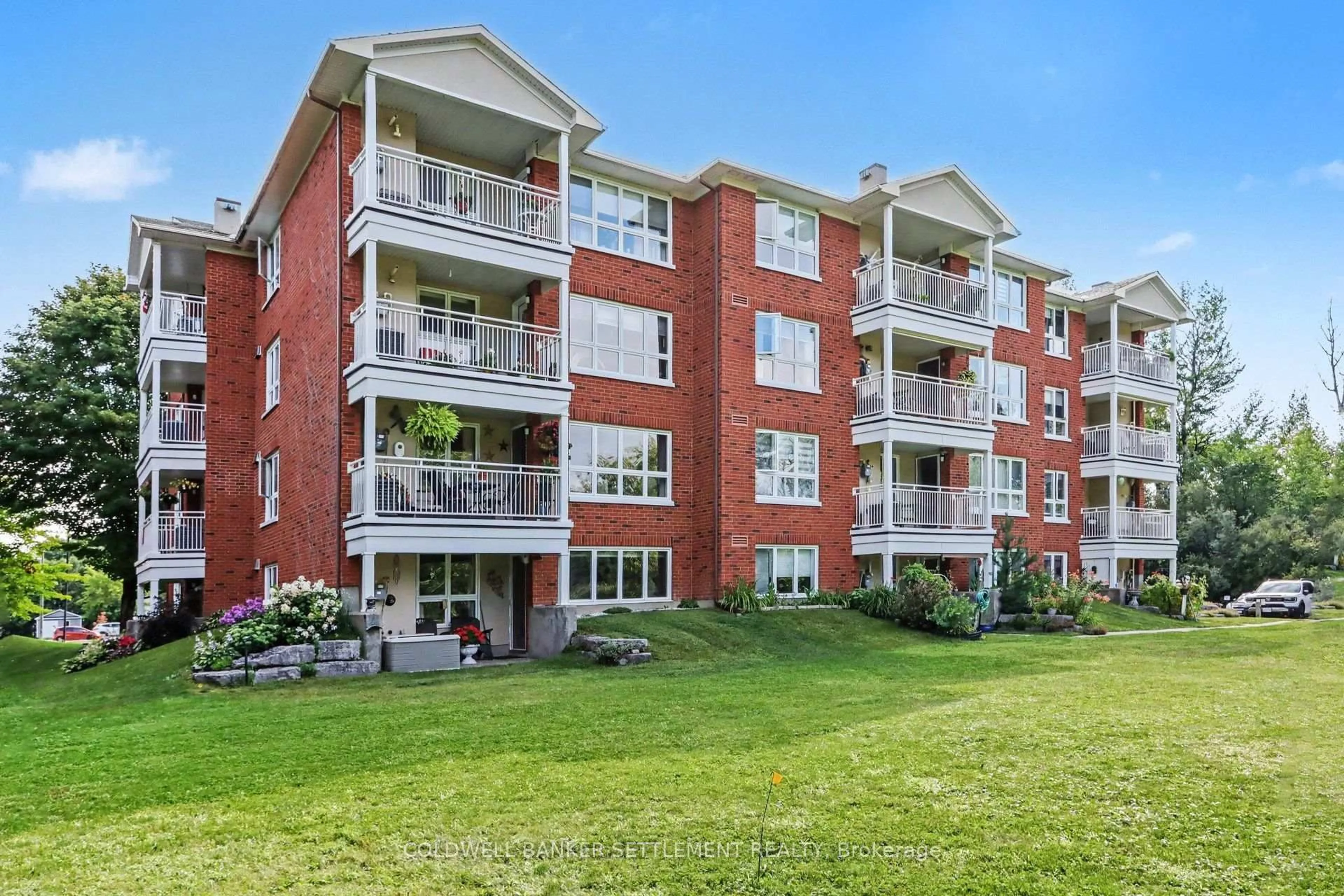 A pic from outside/outdoor area/front of a property/back of a property/a pic from drone, water/lake/river/ocean view for 103 North St #301, Perth Ontario K7H 3P3