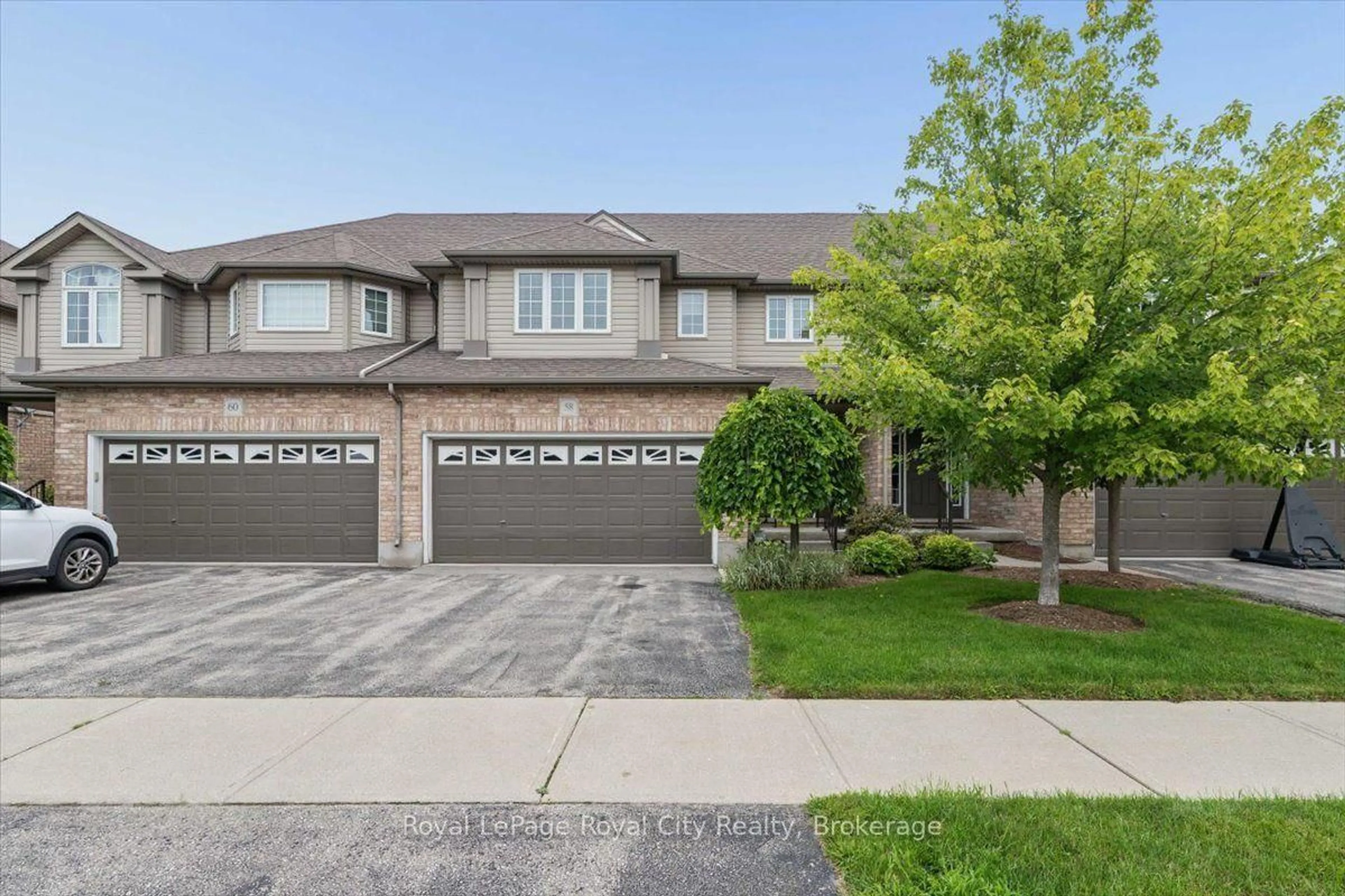 Home with brick exterior material, street for 58 Walker Way, Guelph Ontario N1L 1T7