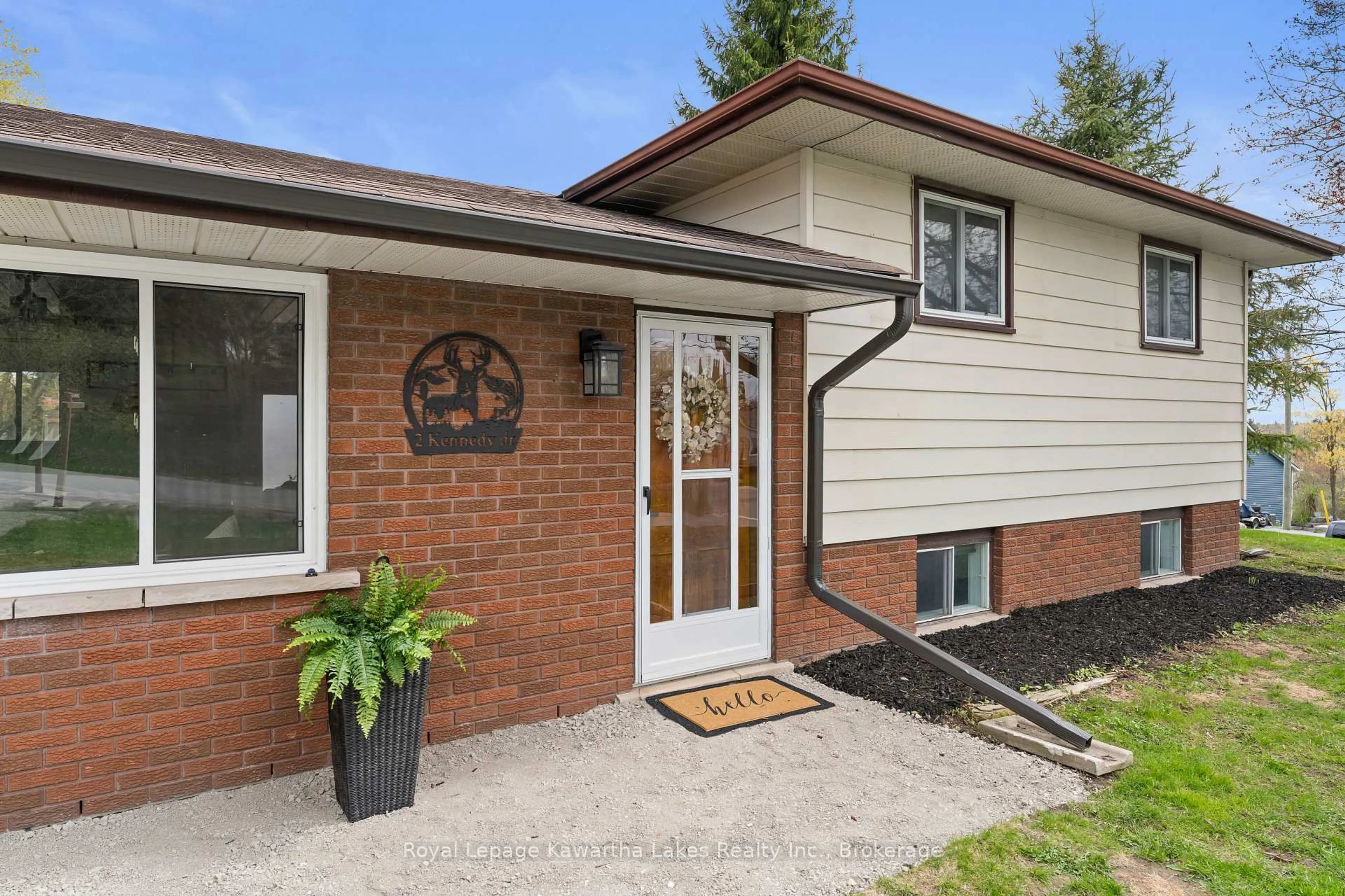 Home with brick exterior material, street for 2 Kennedy Dr, Kawartha Lakes Ontario K0M 1N0
