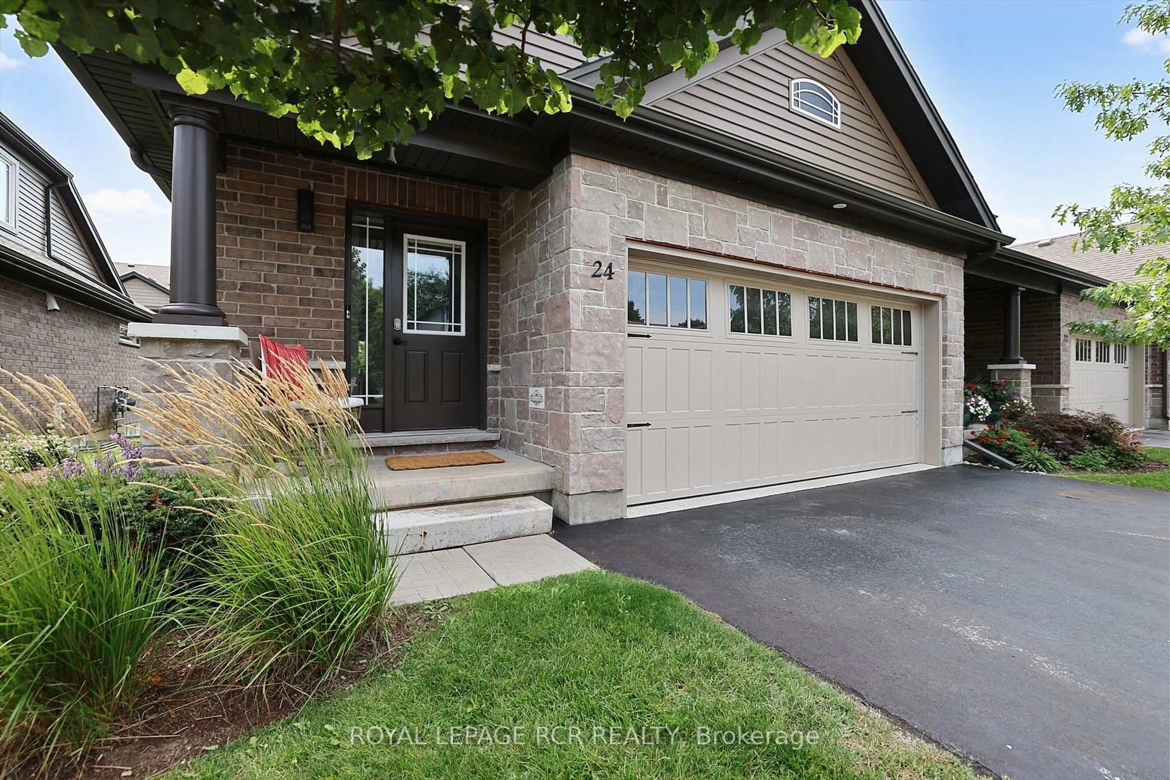 Home with brick exterior material, street for 24 WESTMINSTER Cres, Centre Wellington Ontario N1M 1Y8