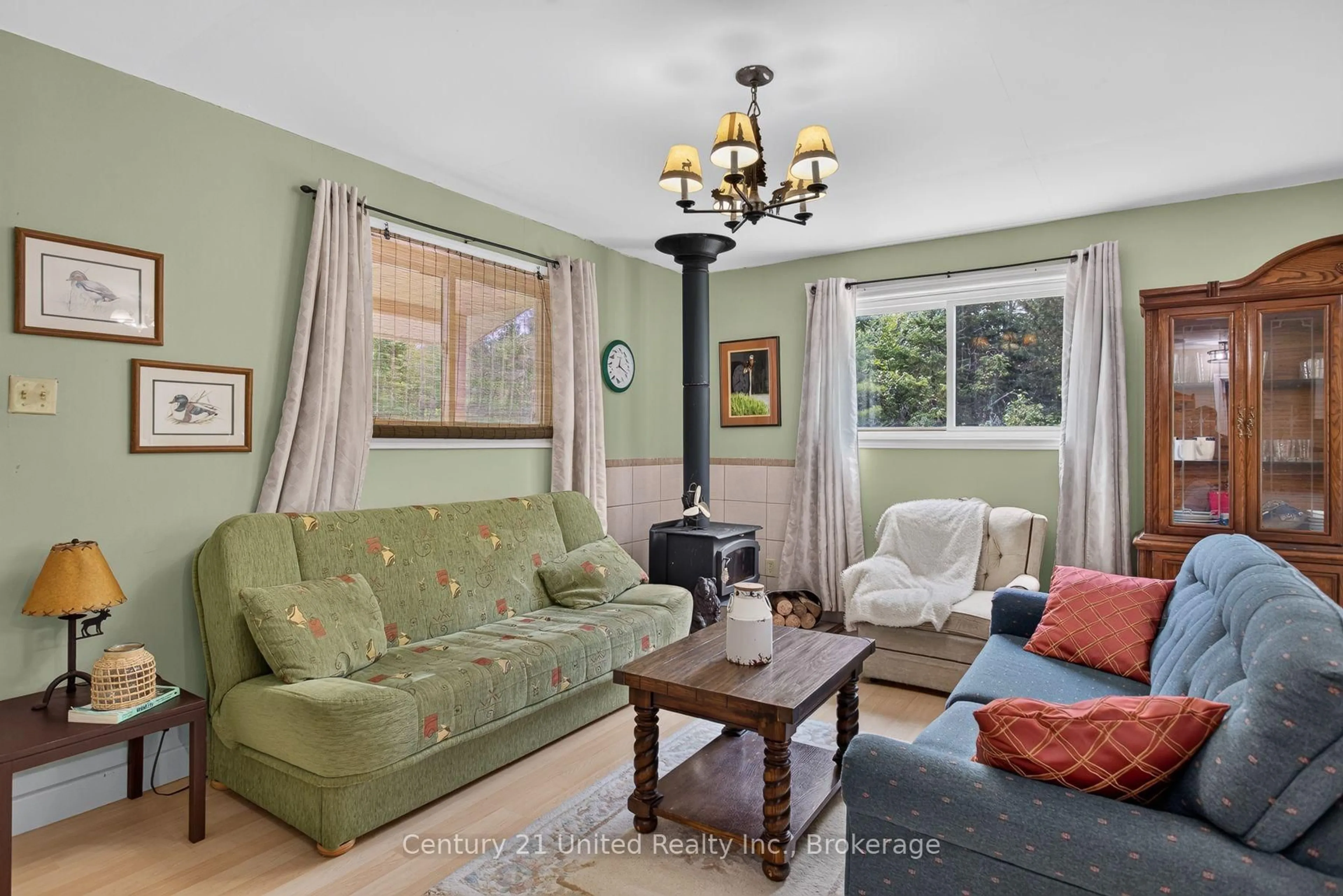 Living room with furniture, unknown for 4092 Highway 620, Wollaston Ontario K0L 1A0