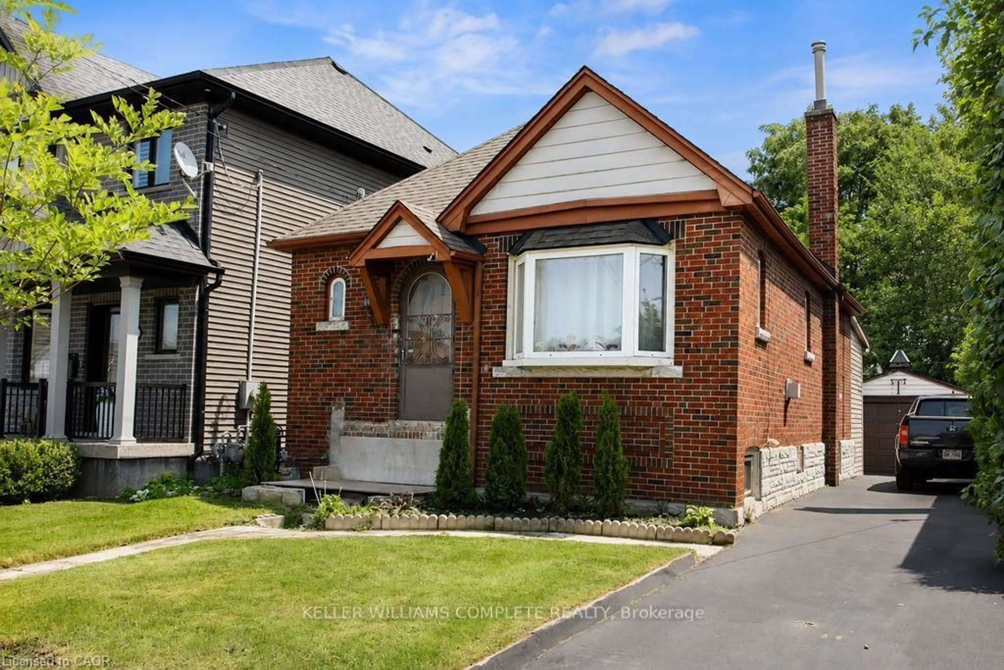 Home with brick exterior material, street for 35 Barons Ave, Hamilton Ontario L8K 2Y1