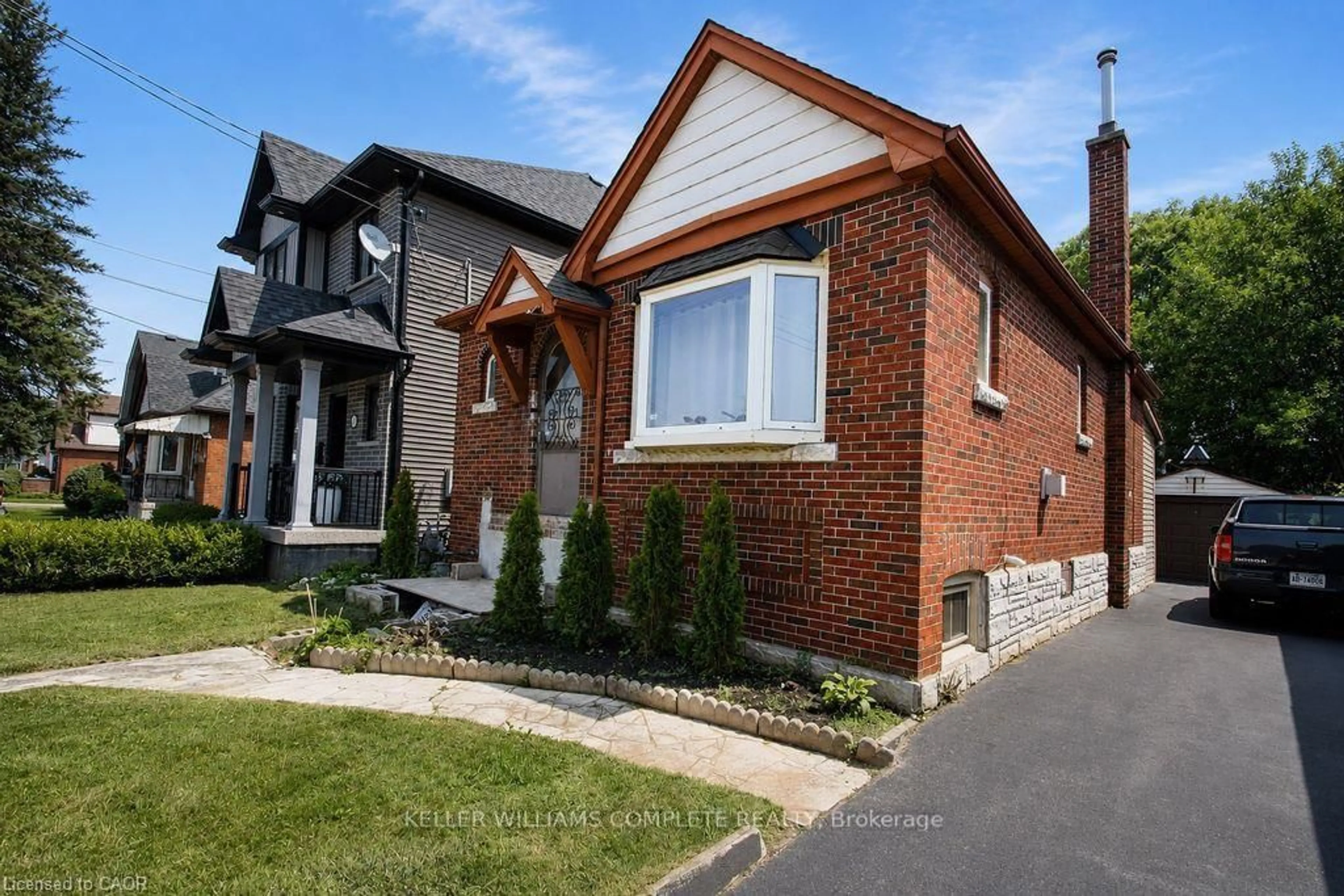Home with brick exterior material, street for 35 Barons Ave, Hamilton Ontario L8K 2Y1