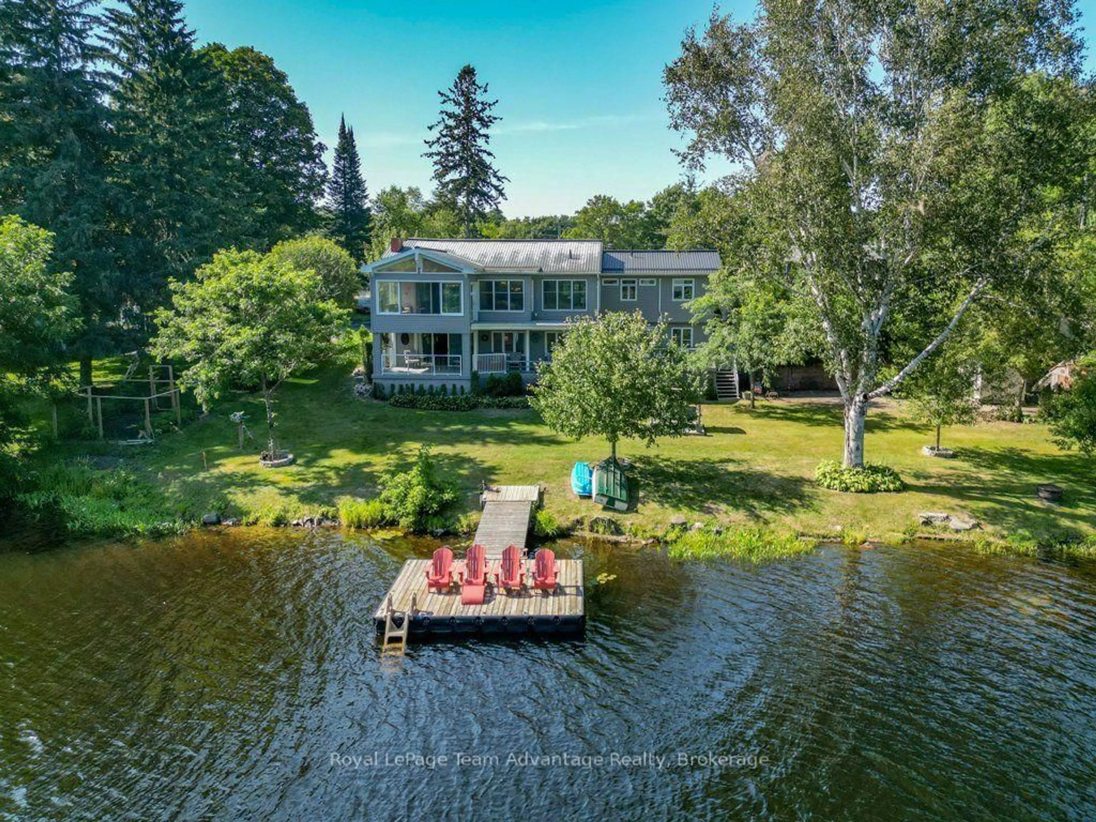 A pic from outside/outdoor area/front of a property/back of a property/a pic from drone, water/lake/river/ocean view for 6 Ginnie St, Parry Sound Ontario P2A 1L1