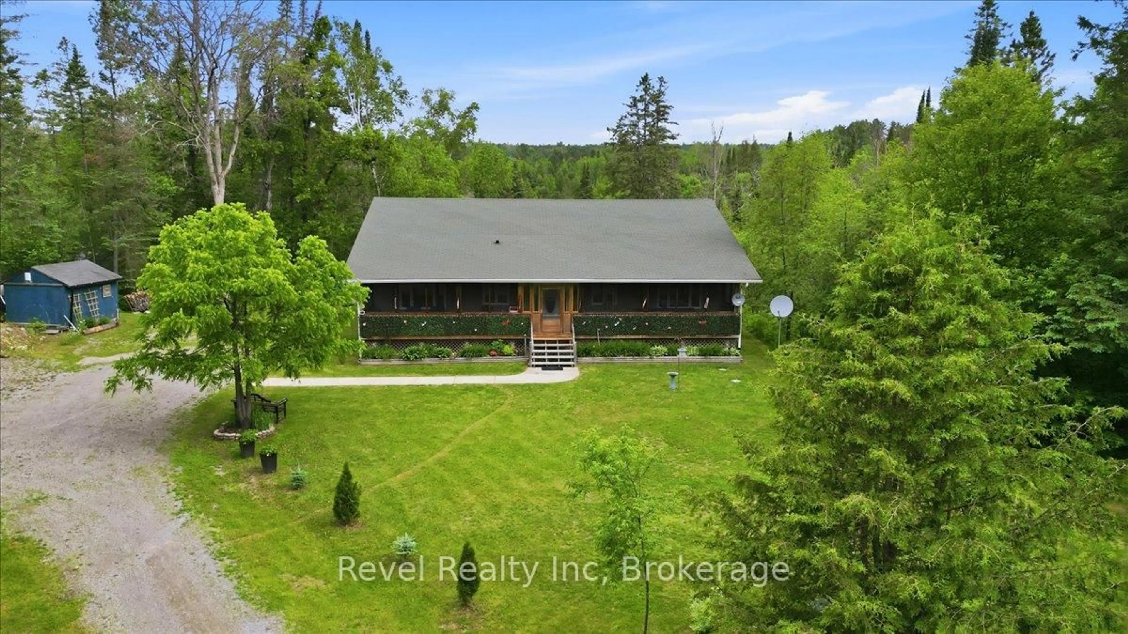 A pic from outside/outdoor area/front of a property/back of a property/a pic from drone, building for 1100 Morning Glory Dr, Highlands East Ontario K0M 1R0