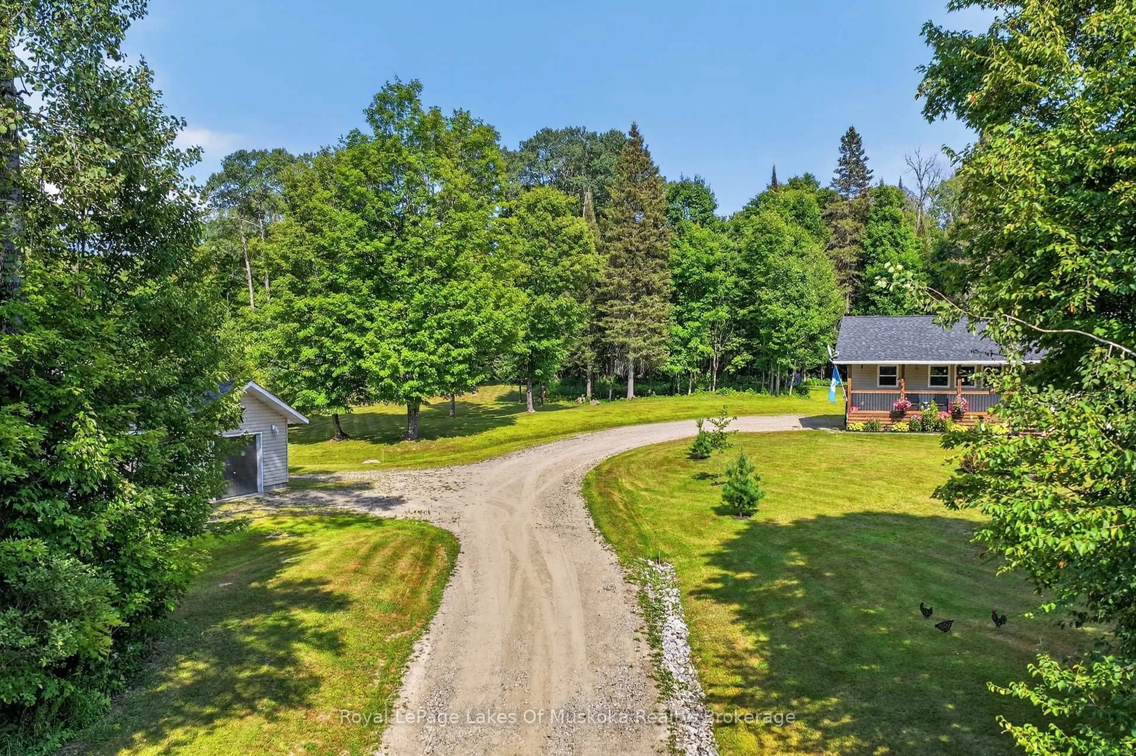 A pic from outside/outdoor area/front of a property/back of a property/a pic from drone, forest/trees view for 400 Chetwynd Rd, Armour Ontario P0A 1C0