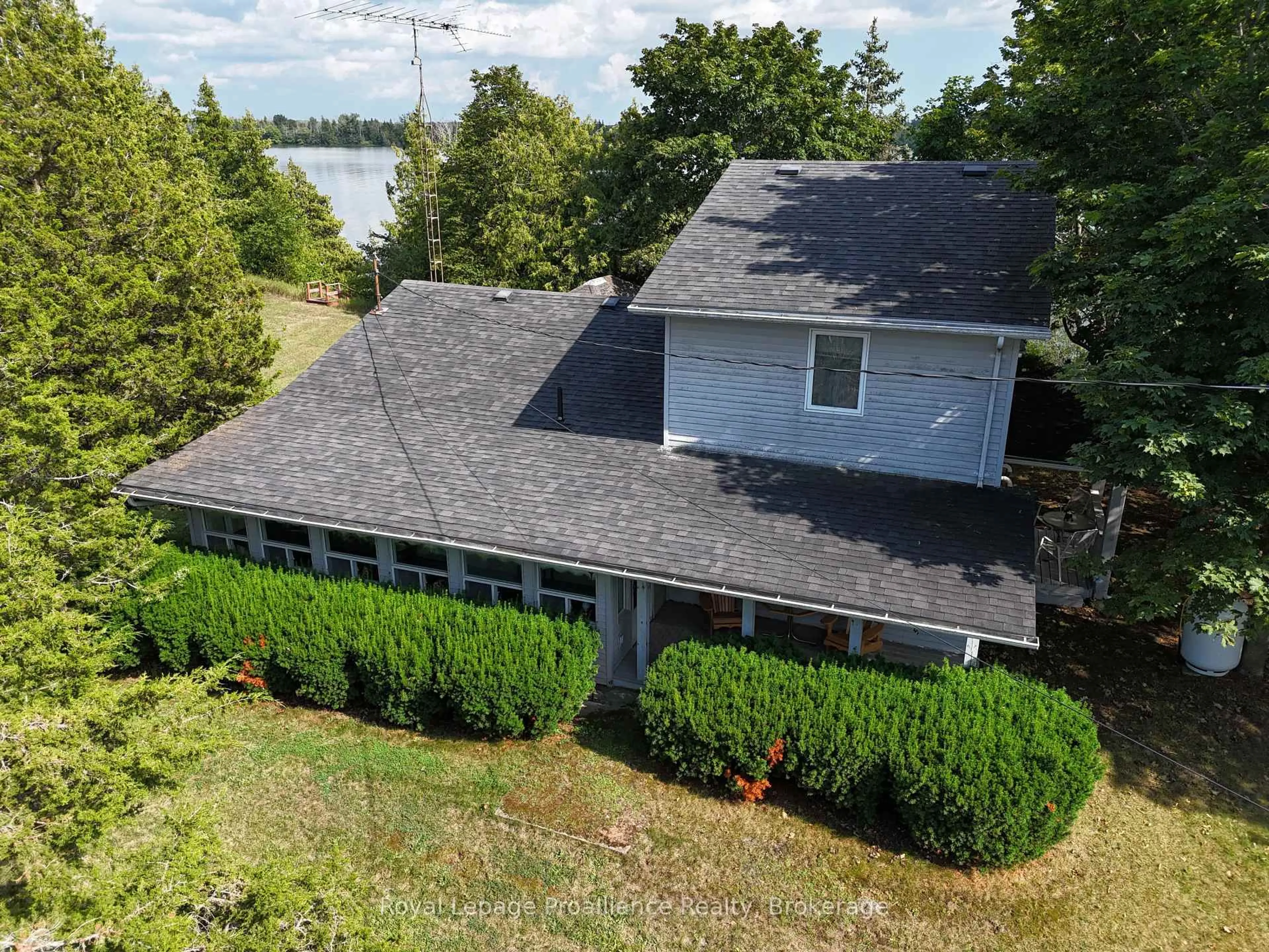 A pic from outside/outdoor area/front of a property/back of a property/a pic from drone, water/lake/river/ocean view for 133 Juniper Lane, Prince Edward County Ontario K0K 1A0