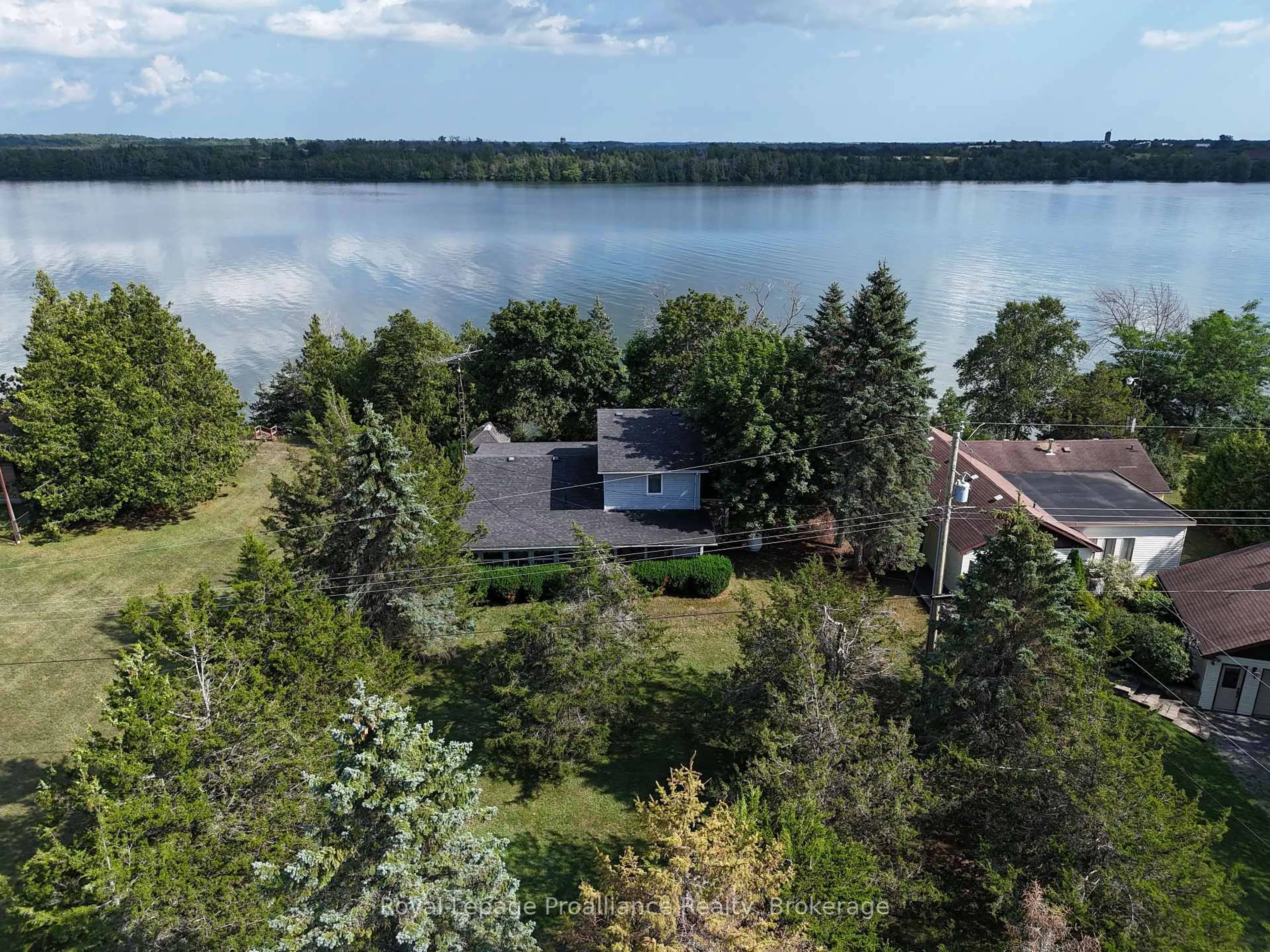 A pic from outside/outdoor area/front of a property/back of a property/a pic from drone, water/lake/river/ocean view for 133 Juniper Lane, Prince Edward County Ontario K0K 1A0
