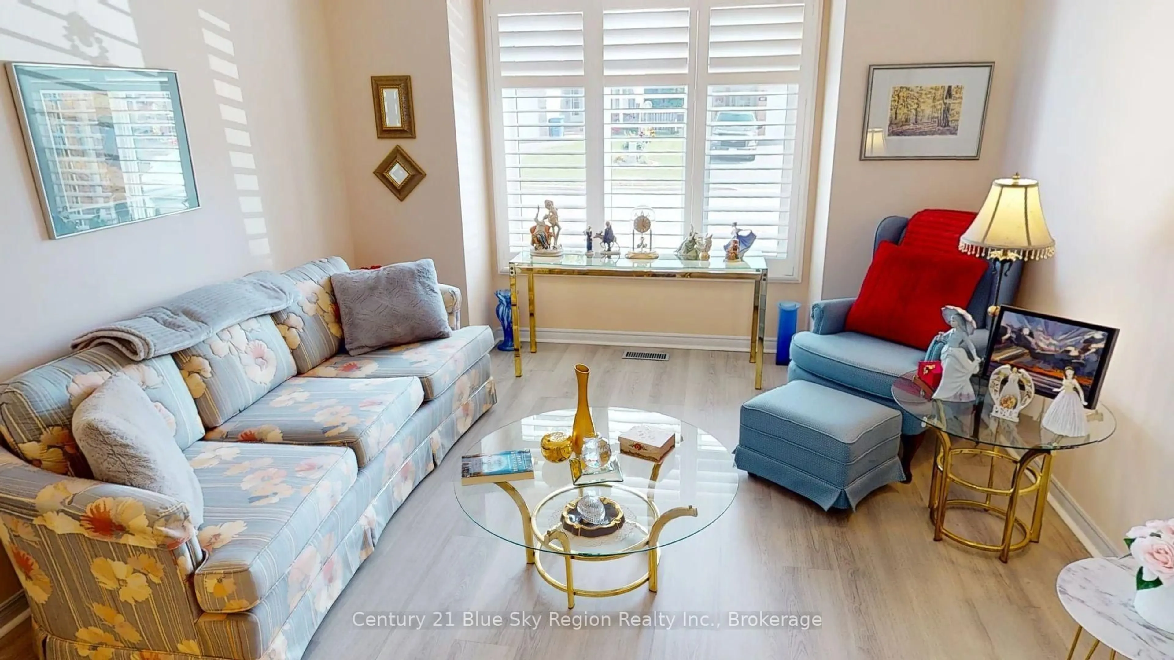 Living room with furniture, wood/laminate floor for 634 Tackaberry Dr, North Bay Ontario P1B 9L1