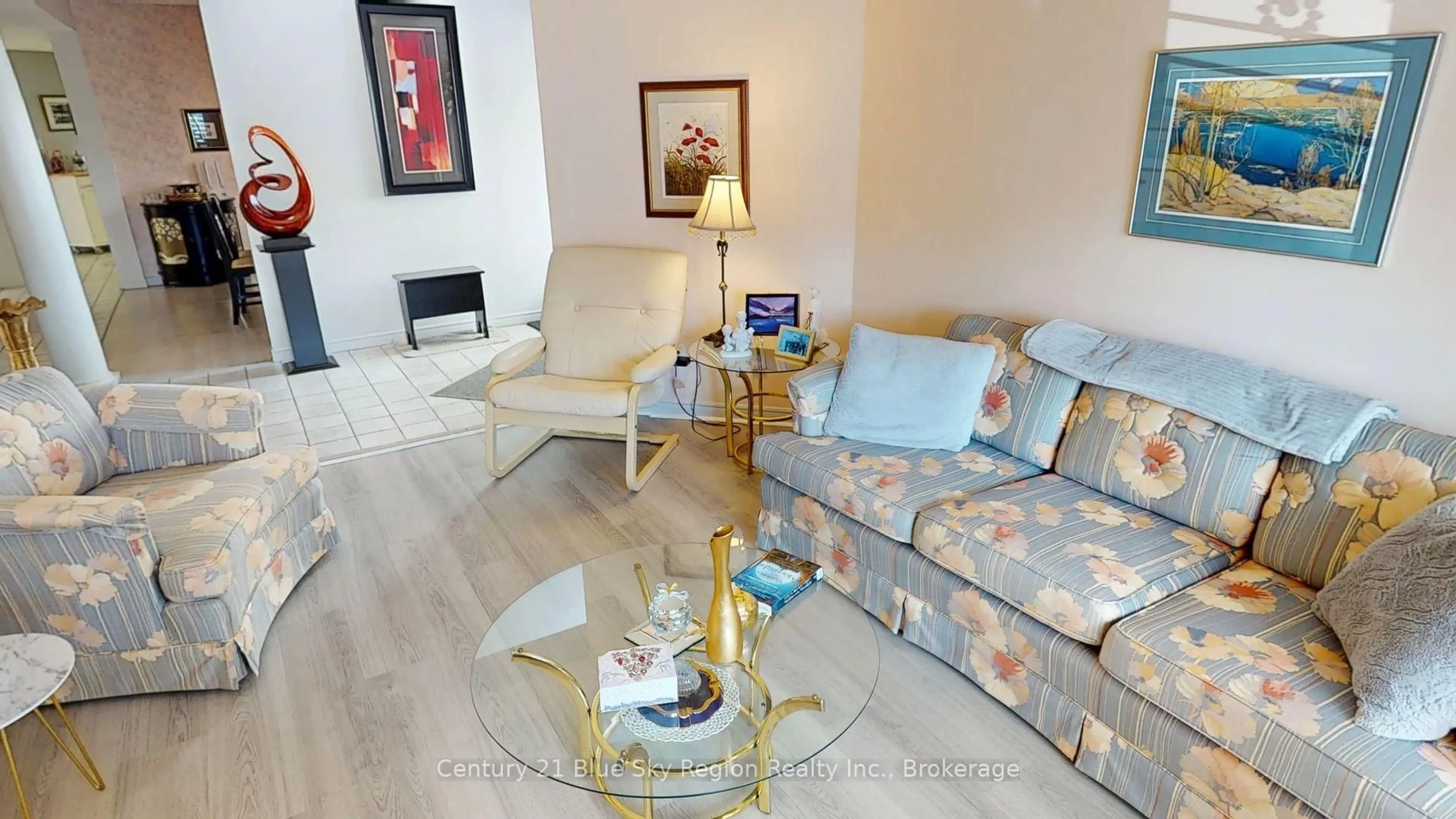 Living room with furniture, wood/laminate floor for 634 Tackaberry Dr, North Bay Ontario P1B 9L1