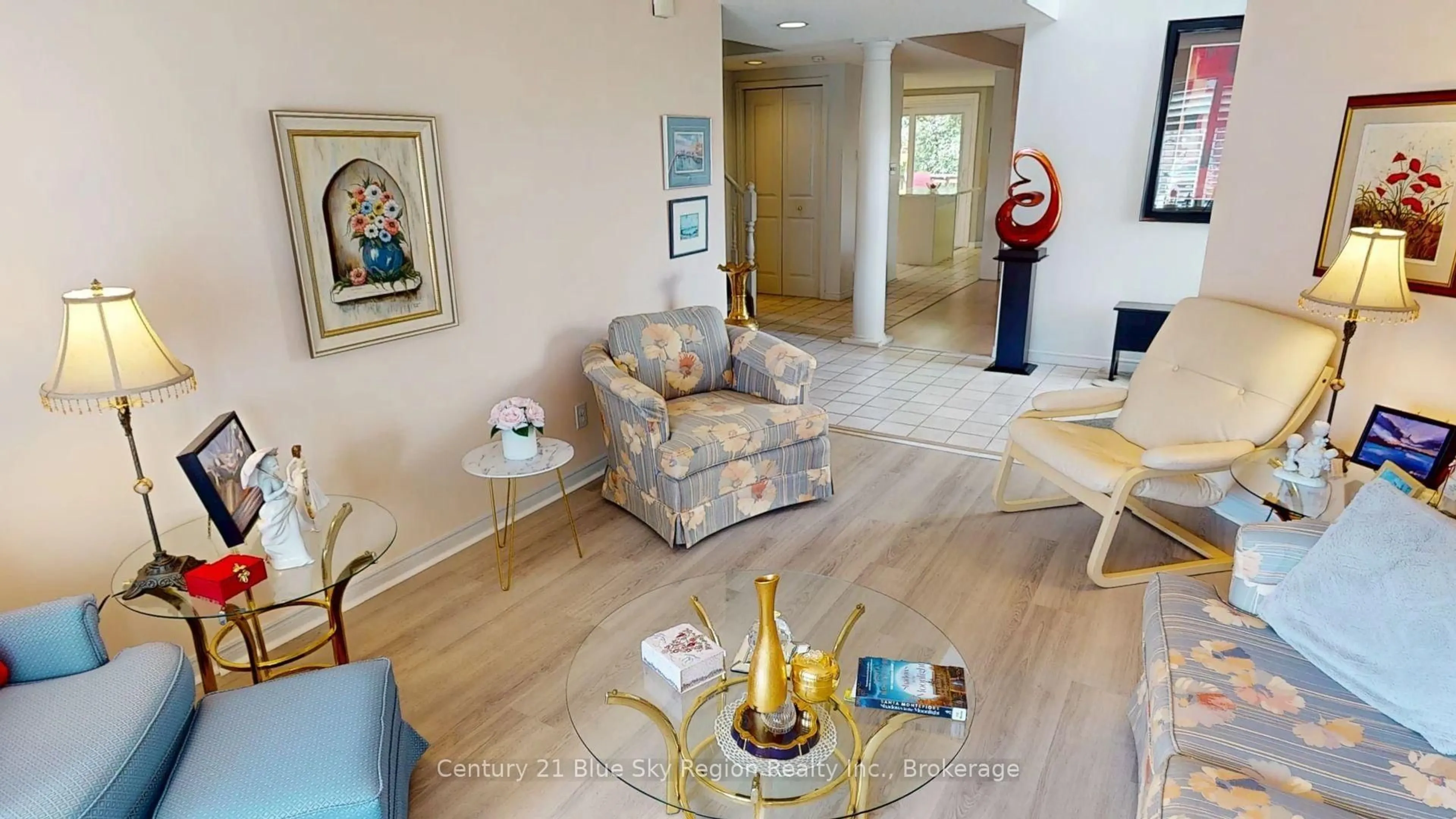 Living room with furniture, wood/laminate floor for 634 Tackaberry Dr, North Bay Ontario P1B 9L1
