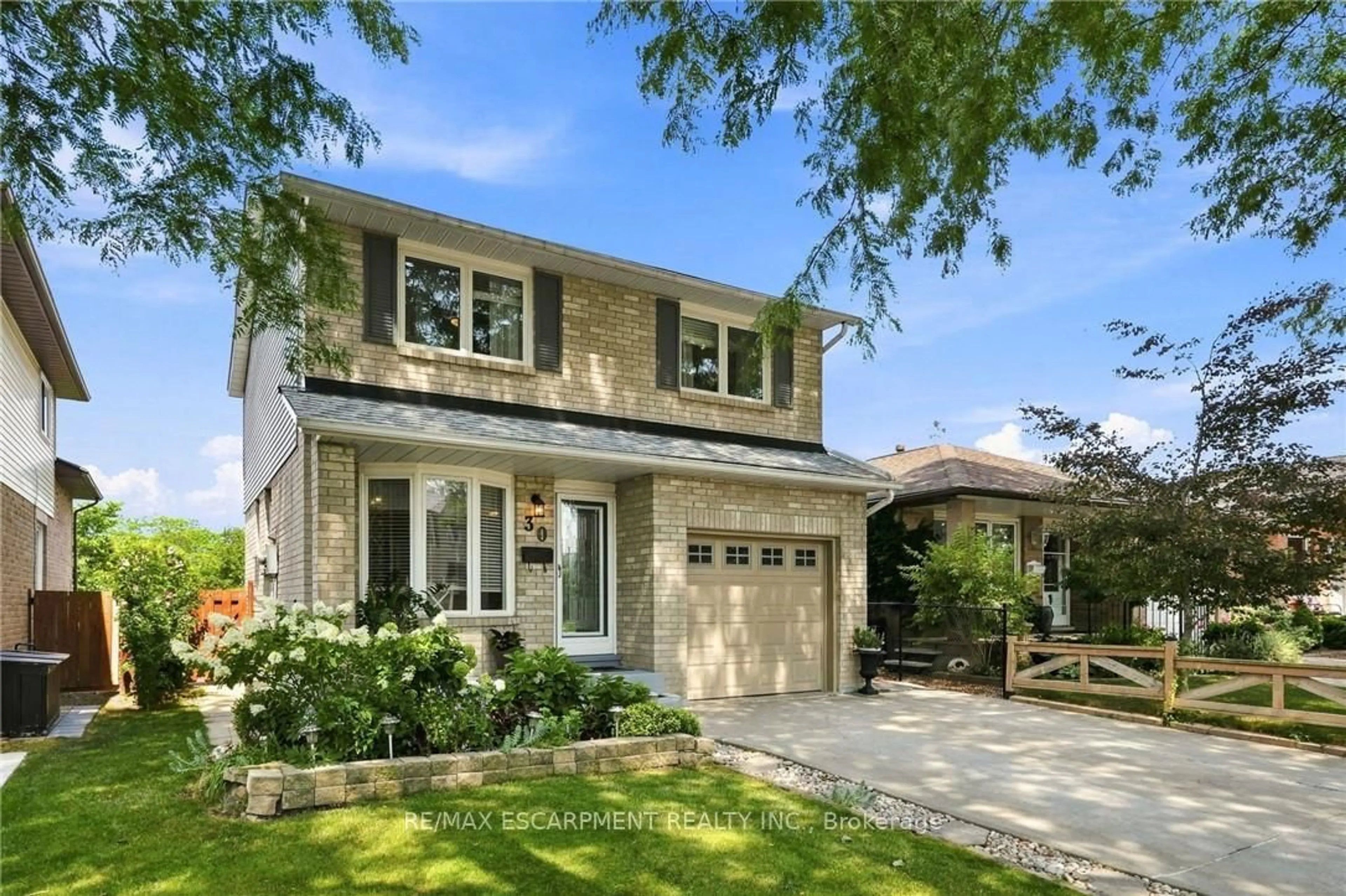 Home with brick exterior material, street for 30 Twinoaks Cres, Hamilton Ontario L8J 2E9