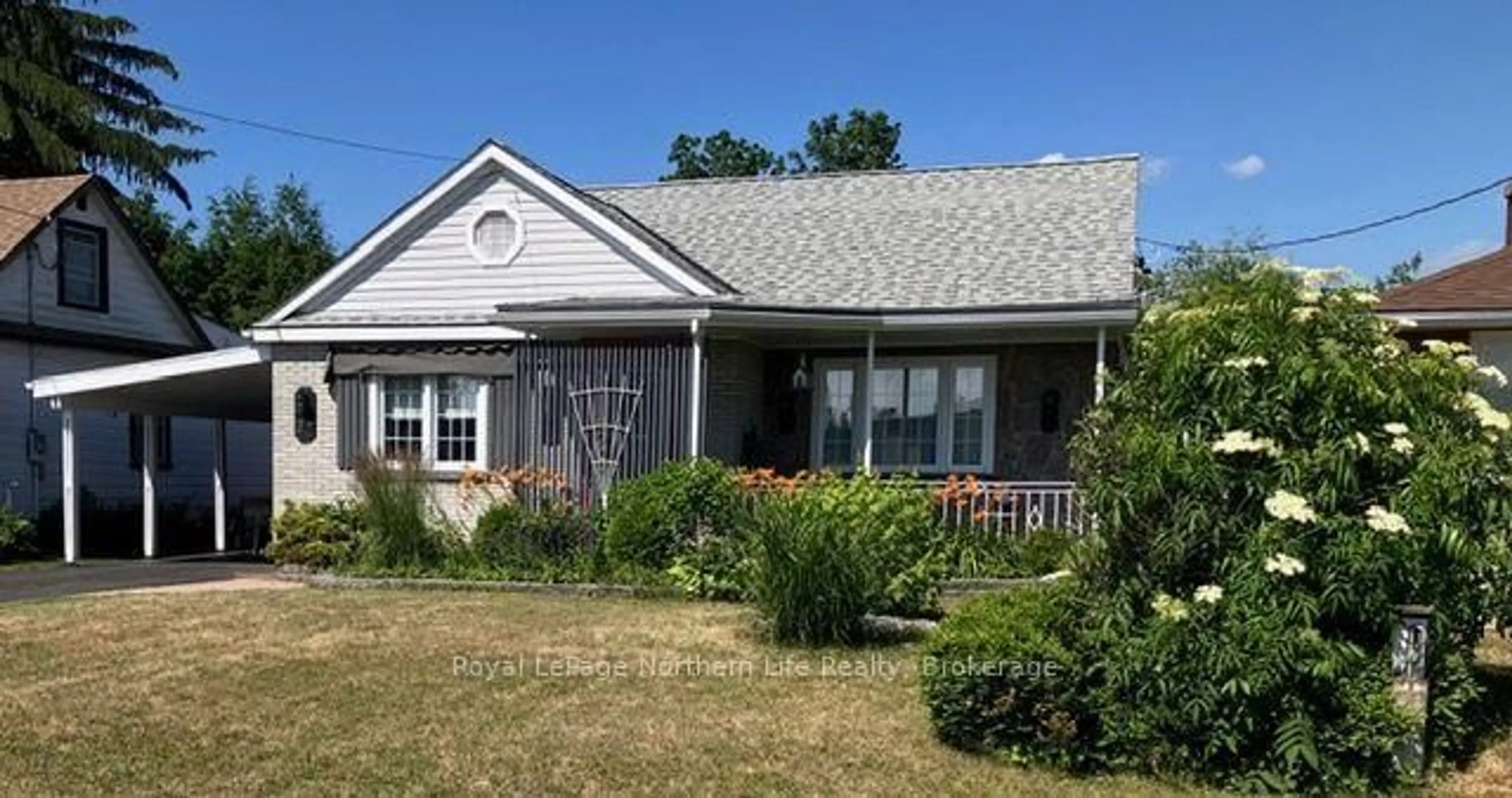 Home with vinyl exterior material, street for 73 Main St, West Nipissing Ontario P2B 1N4