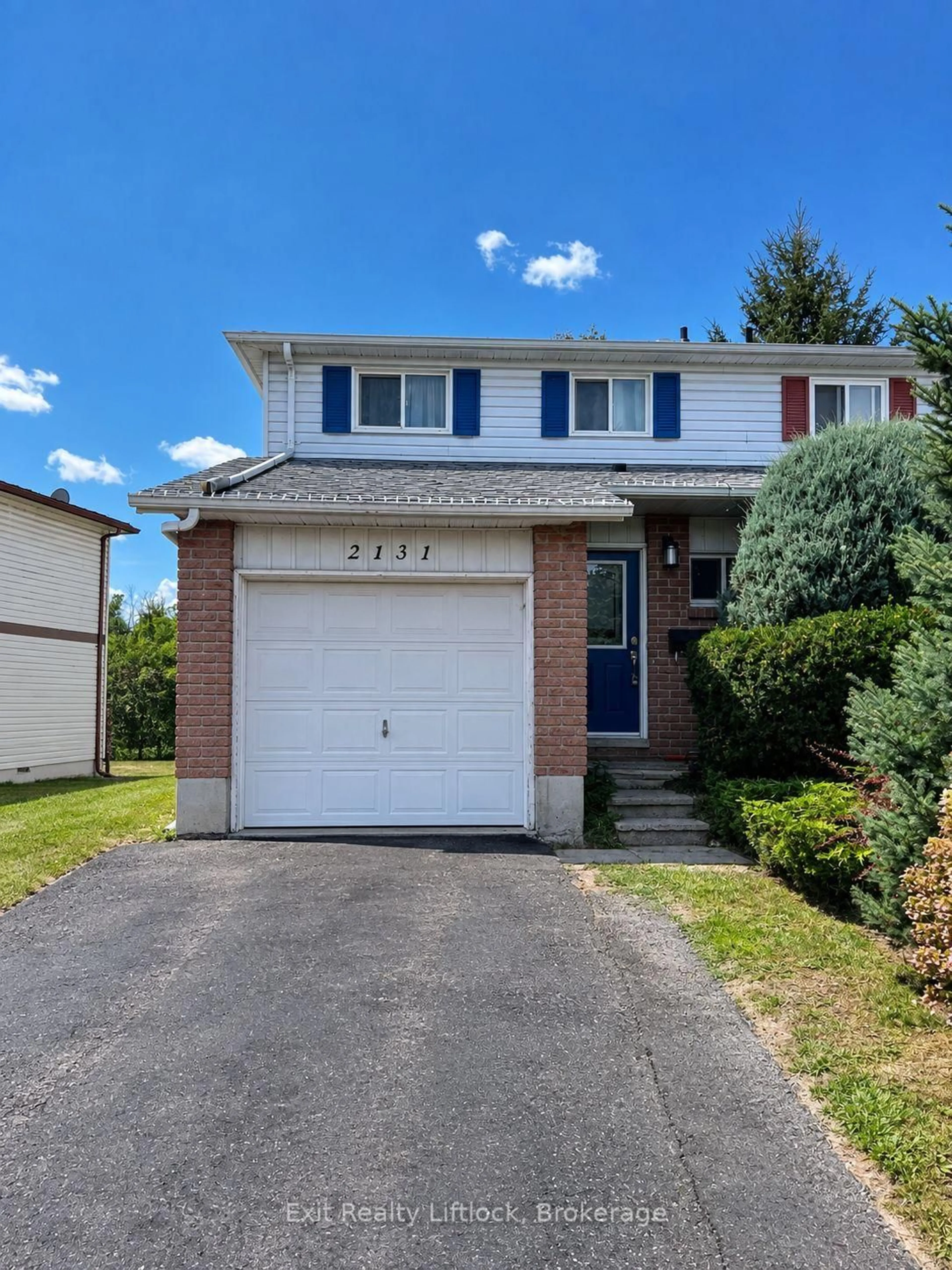Home with vinyl exterior material, street for 2131 Walker Ave, Peterborough Ontario K9L 1T6