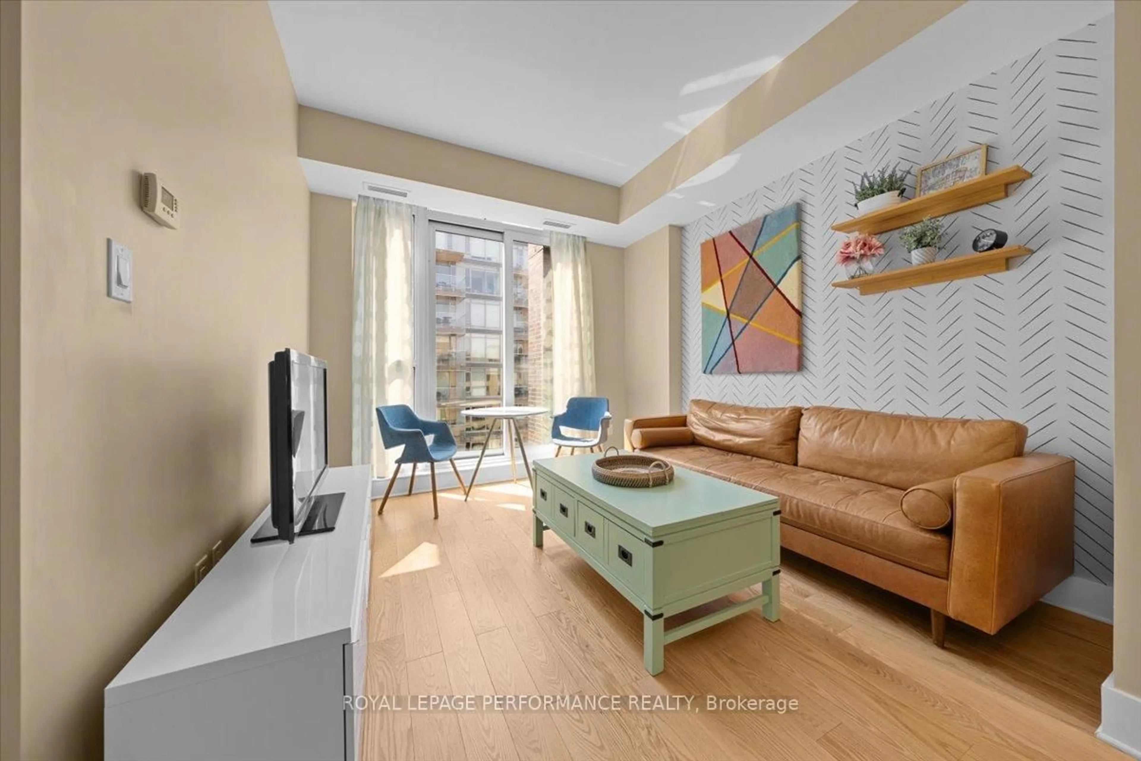 Living room with furniture, unknown for 101 Richmond Rd #616, Ottawa Ontario K1Z 0A6