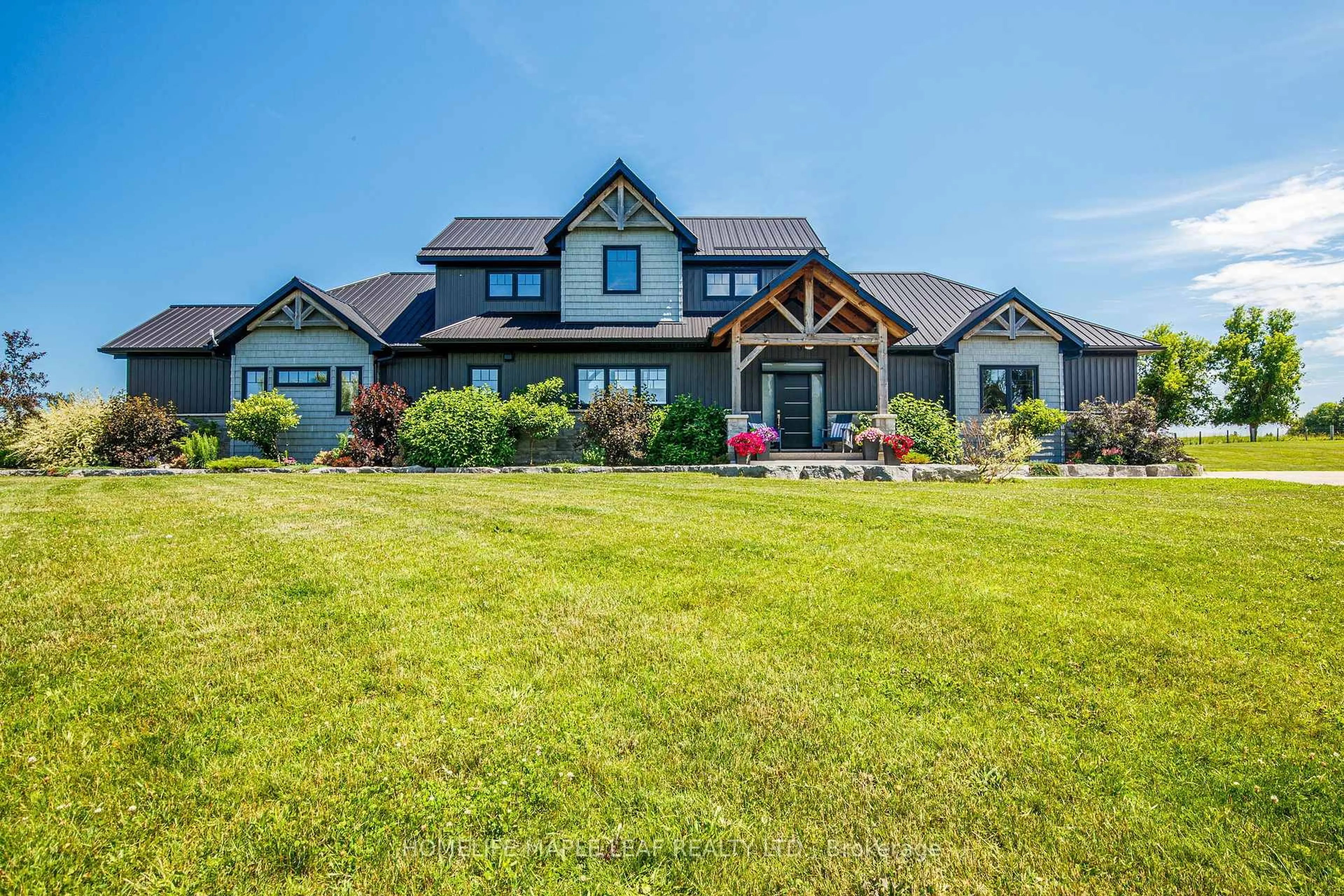 Home with vinyl exterior material, mountain view for 585437 County Rd #17, Melancthon Ontario L9V 1Z1