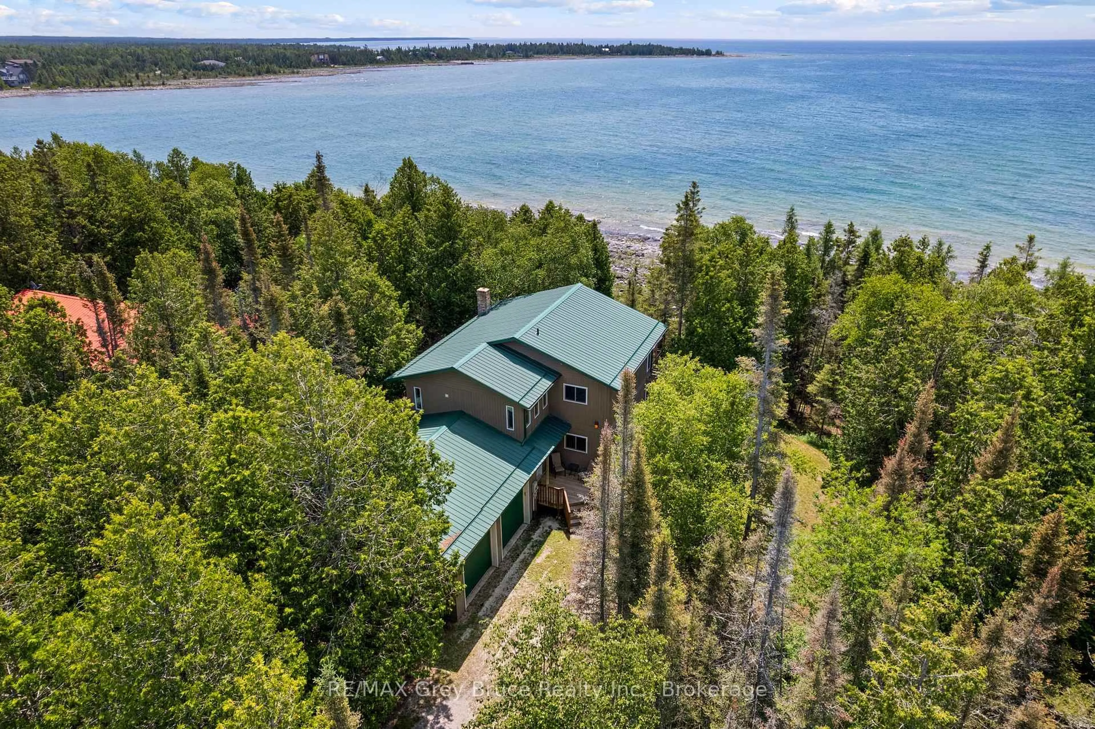 A pic from outside/outdoor area/front of a property/back of a property/a pic from drone, water/lake/river/ocean view for 1132 Dorcas Bay Rd, Northern Bruce Peninsula Ontario N0H 2R0