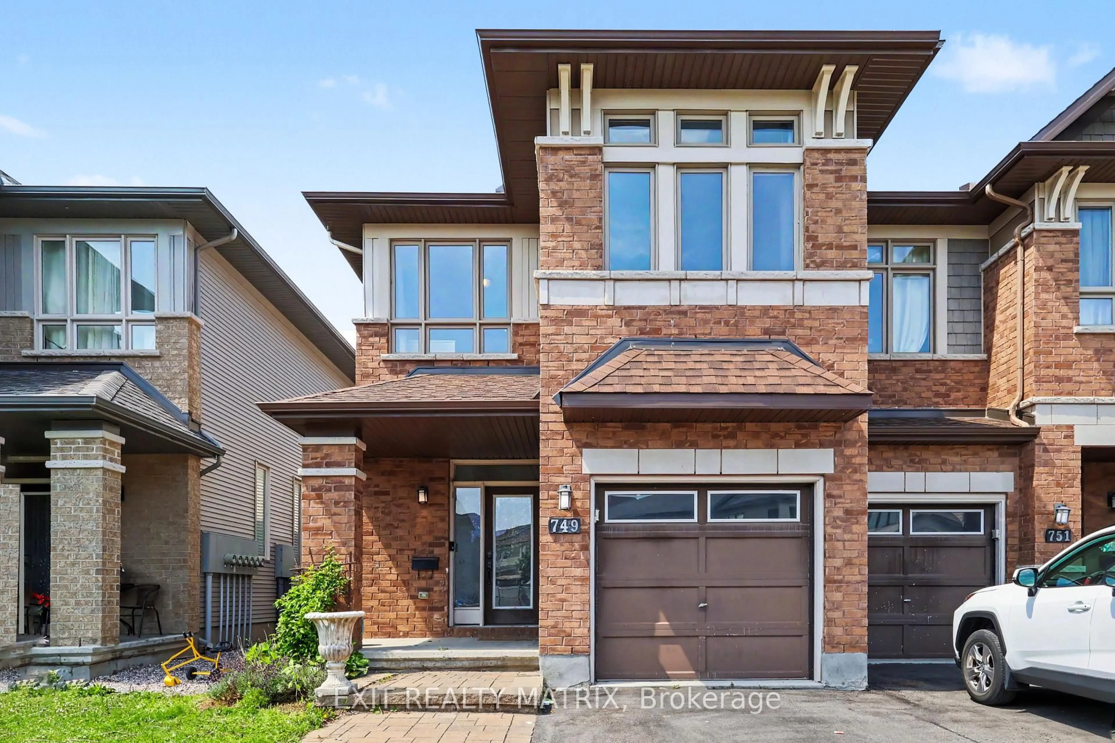 Home with brick exterior material, street for 749 Morningstar Way, Ottawa Ontario K1W 0G6