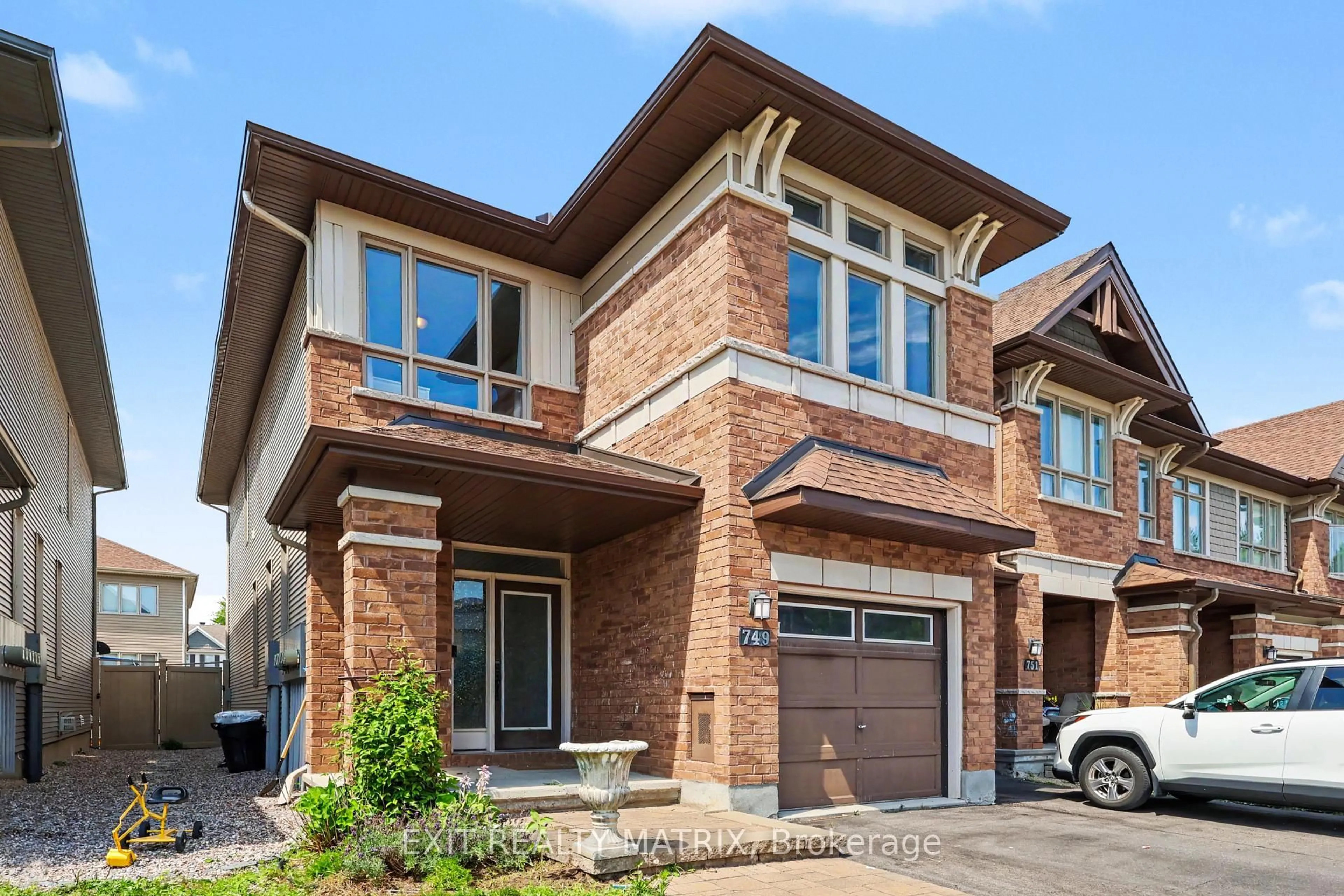 Home with brick exterior material, street for 749 Morningstar Way, Ottawa Ontario K1W 0G6
