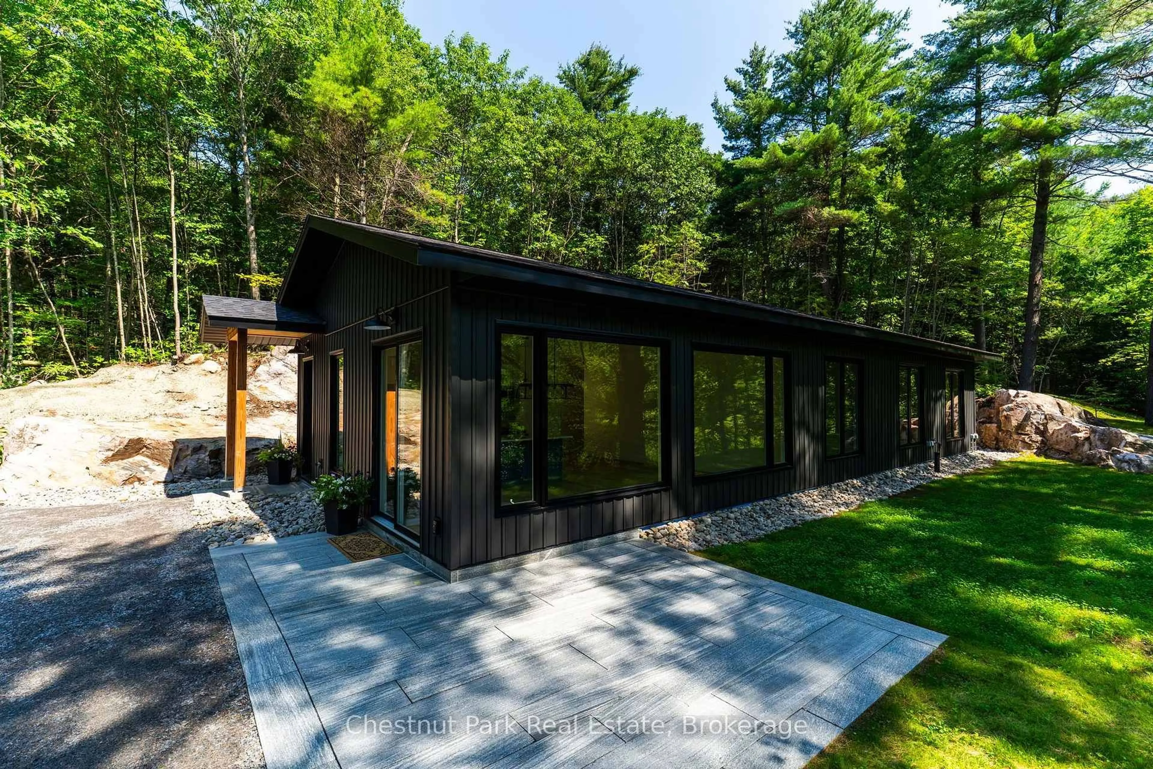 Patio, forest/trees view for 1510 Highway 141, Huntsville Ontario P0B 1M0