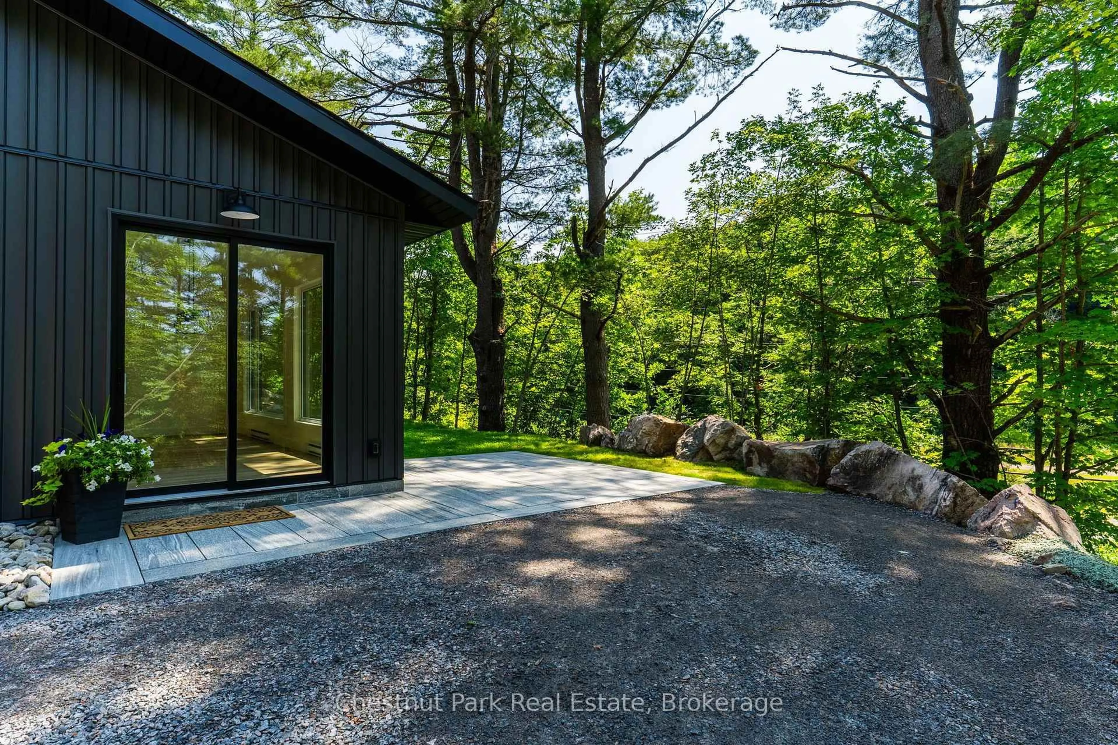 Patio, forest/trees view for 1510 Highway 141, Huntsville Ontario P0B 1M0