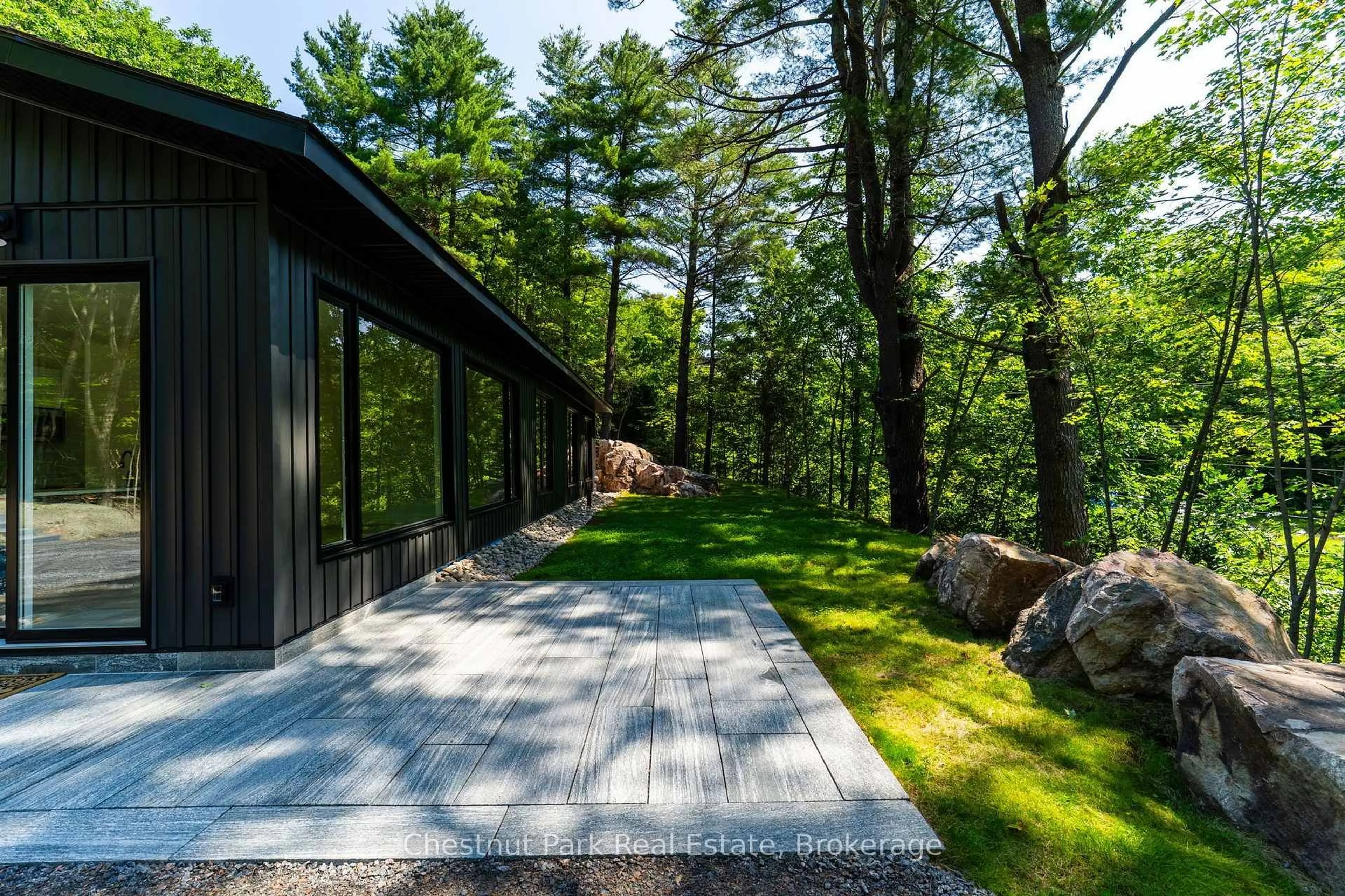 Patio, forest/trees view for 1510 Highway 141, Huntsville Ontario P0B 1M0