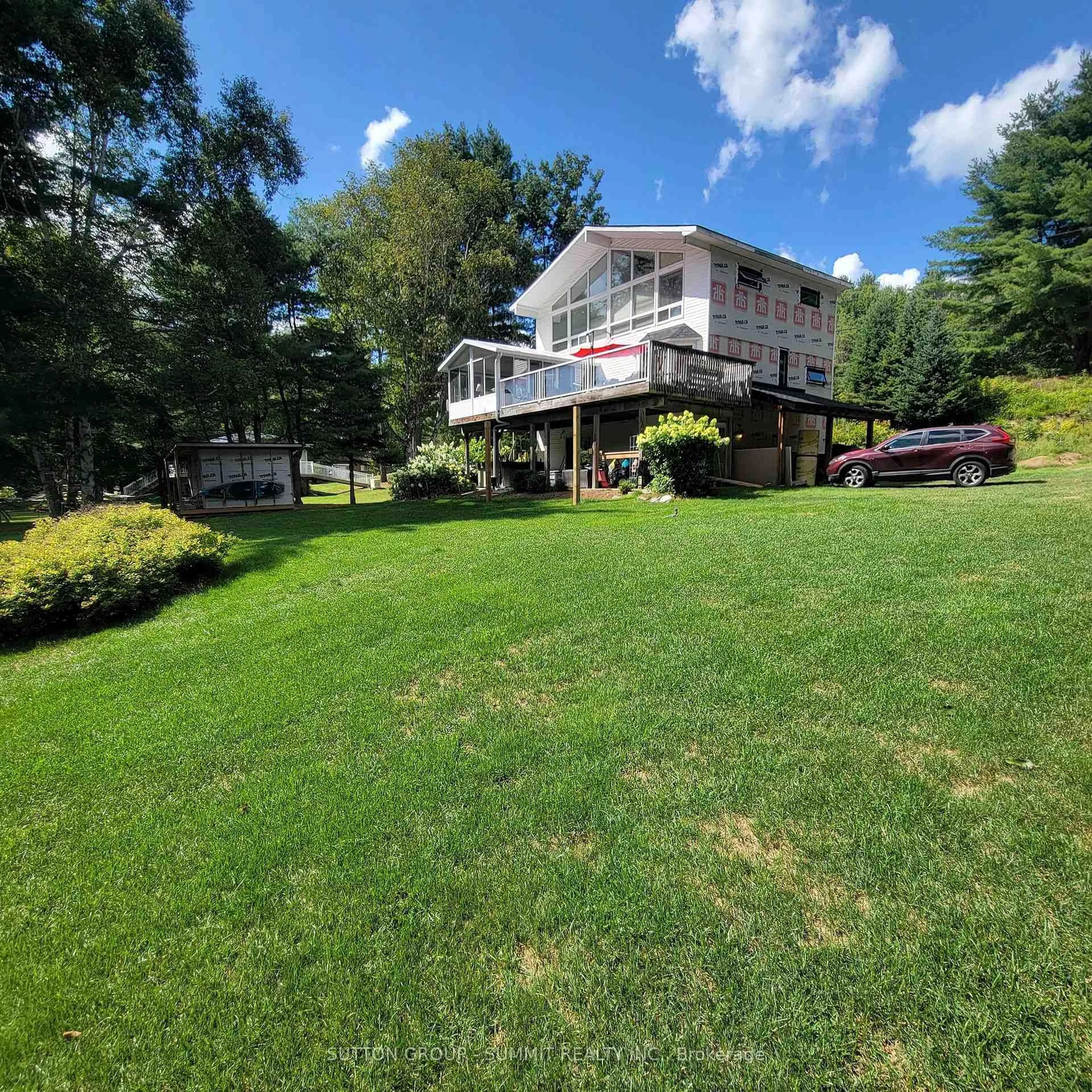 A pic from outside/outdoor area/front of a property/back of a property/a pic from drone, water/lake/river/ocean view for 279 SEELY'S Rd, Huntsville Ontario P1H 2J3