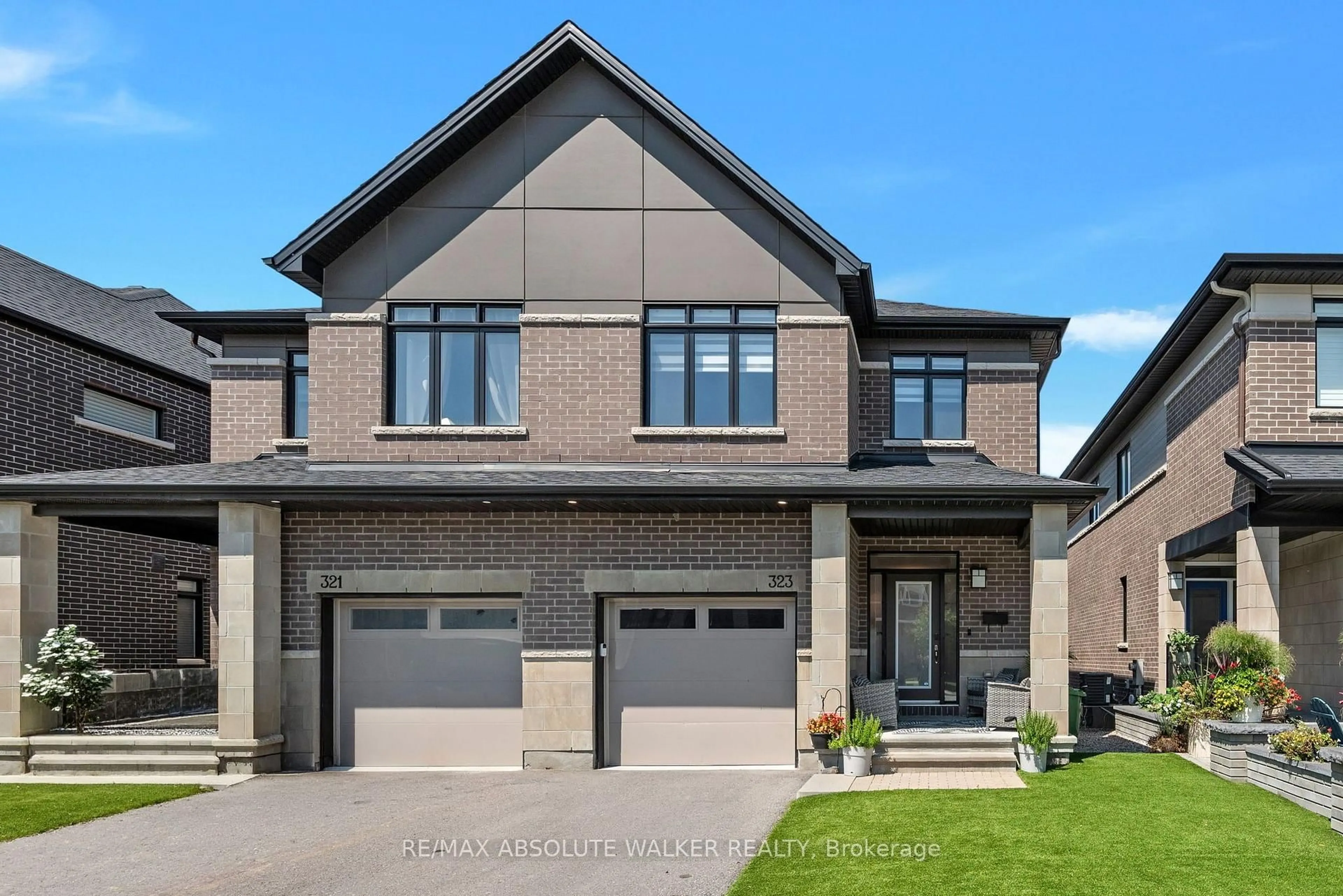 Home with brick exterior material, street for 323 Lysander Pl, Ottawa Ontario K1K 3X8