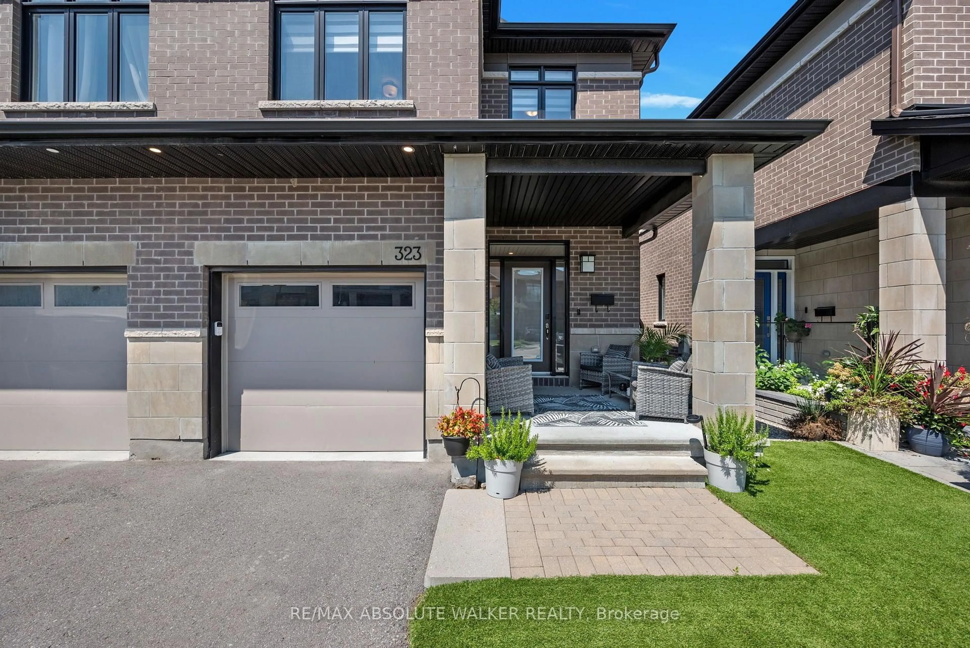 Home with brick exterior material, street for 323 Lysander Pl, Ottawa Ontario K1K 3X8