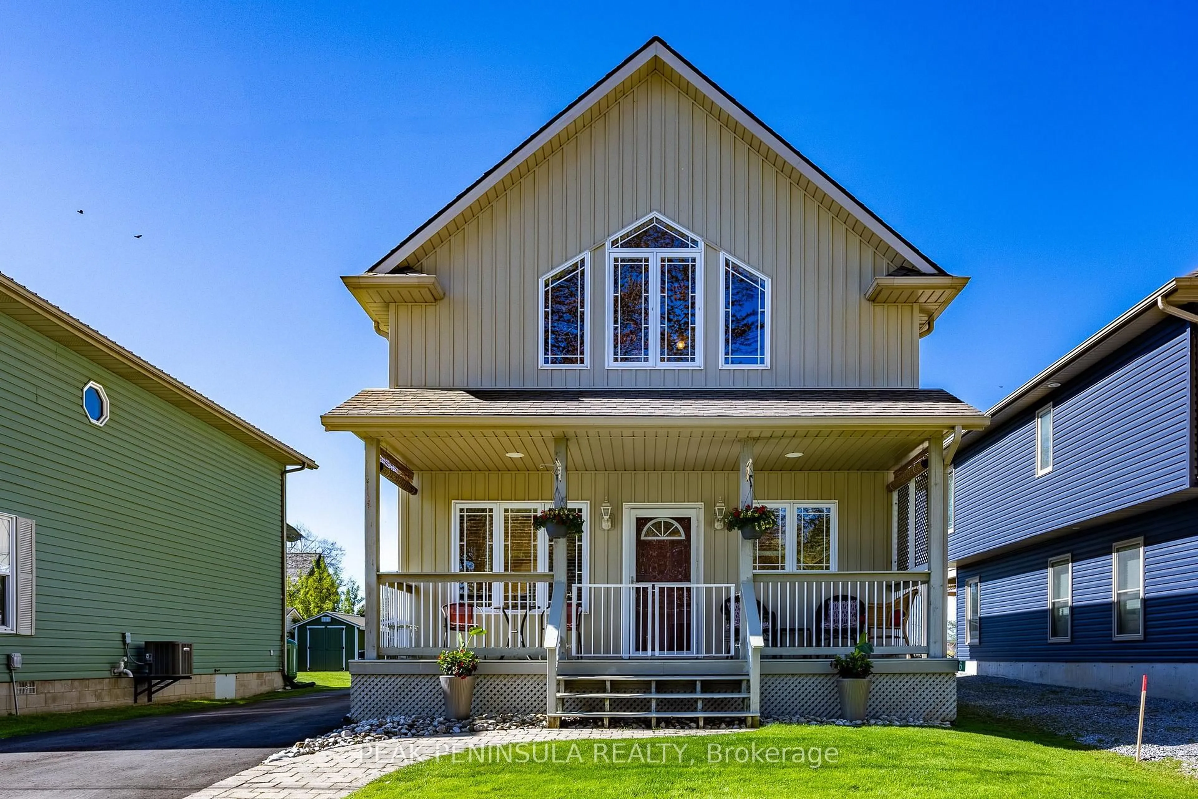 Home with vinyl exterior material, street for 6 Reserve St, Norfolk Ontario N0E 1T0