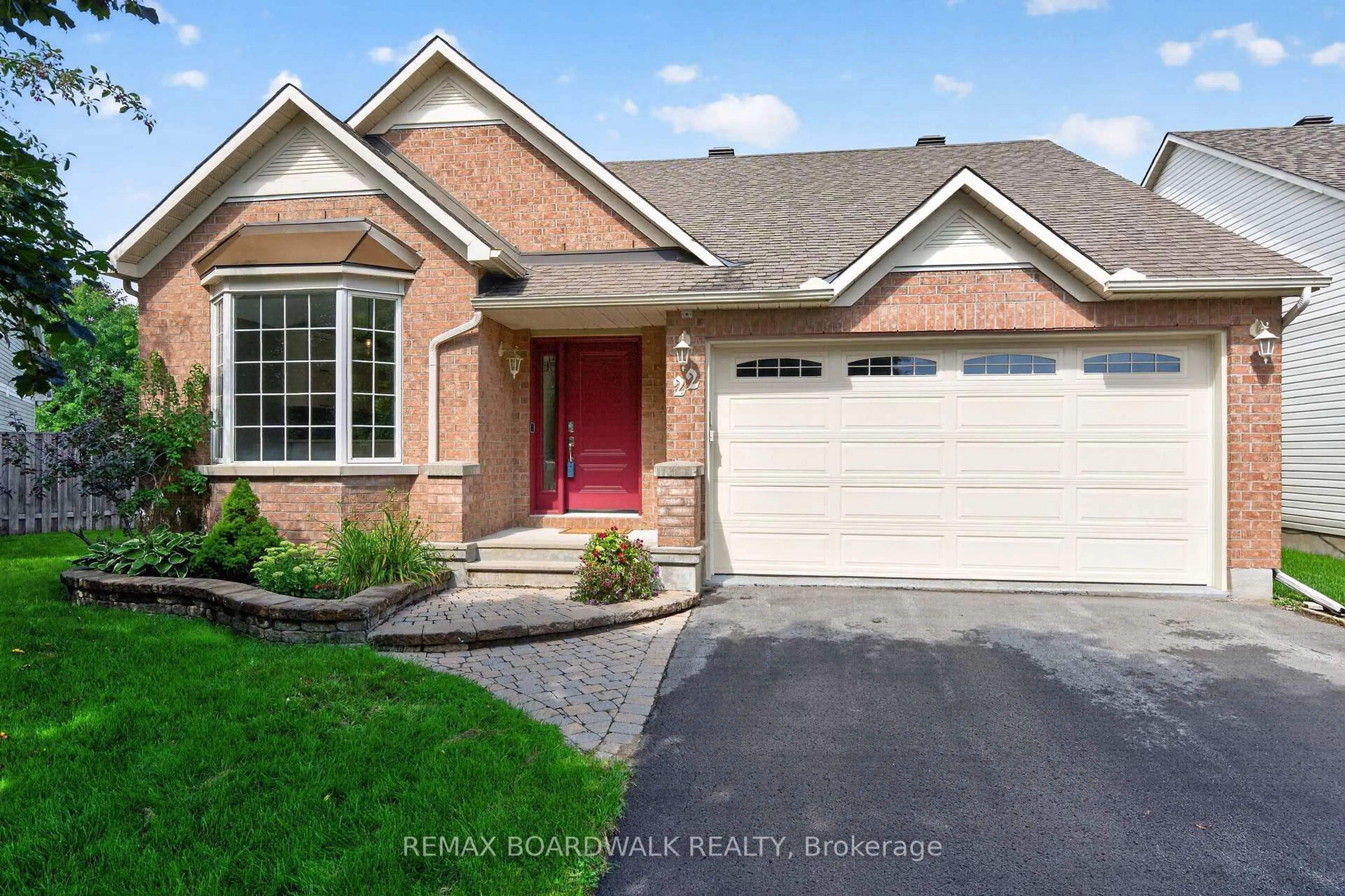 Home with brick exterior material, street for 22 Burnstead Cres, Ottawa Ontario K2M 2T7