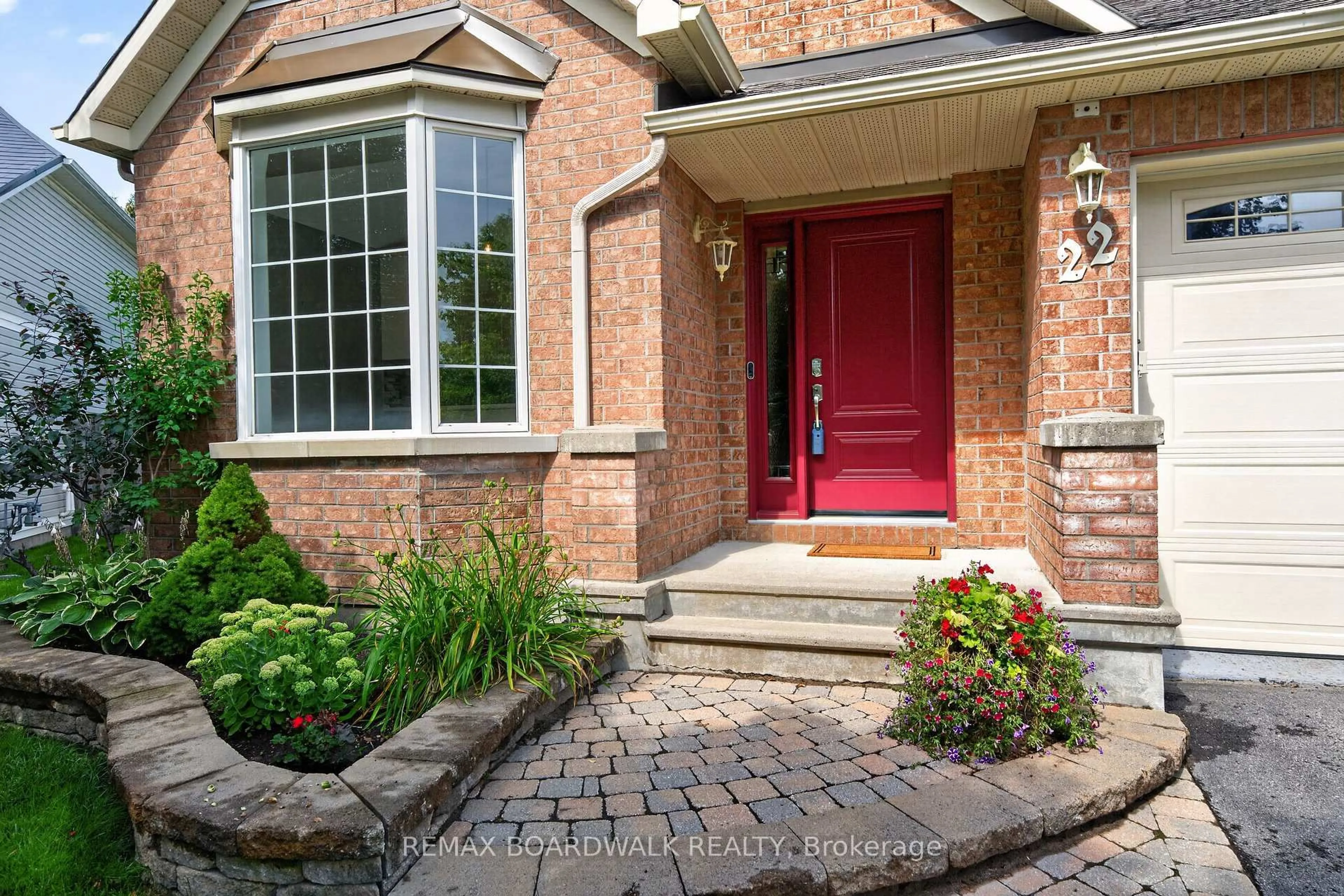 Home with brick exterior material, street for 22 Burnstead Cres, Ottawa Ontario K2M 2T7