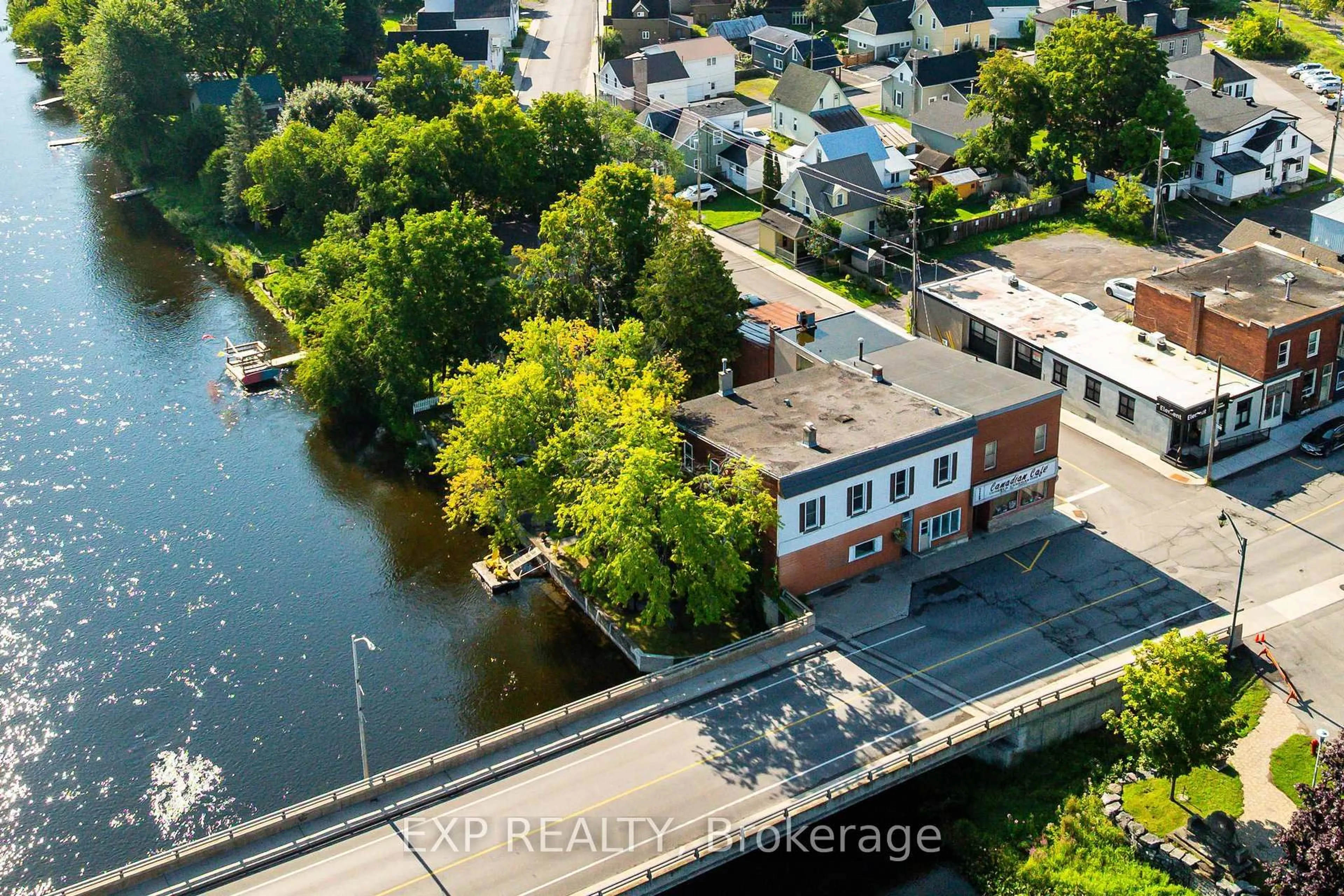 A pic from outside/outdoor area/front of a property/back of a property/a pic from drone, water/lake/river/ocean view for 5-7 Bridge St, Almonte Ontario K0A 1A0