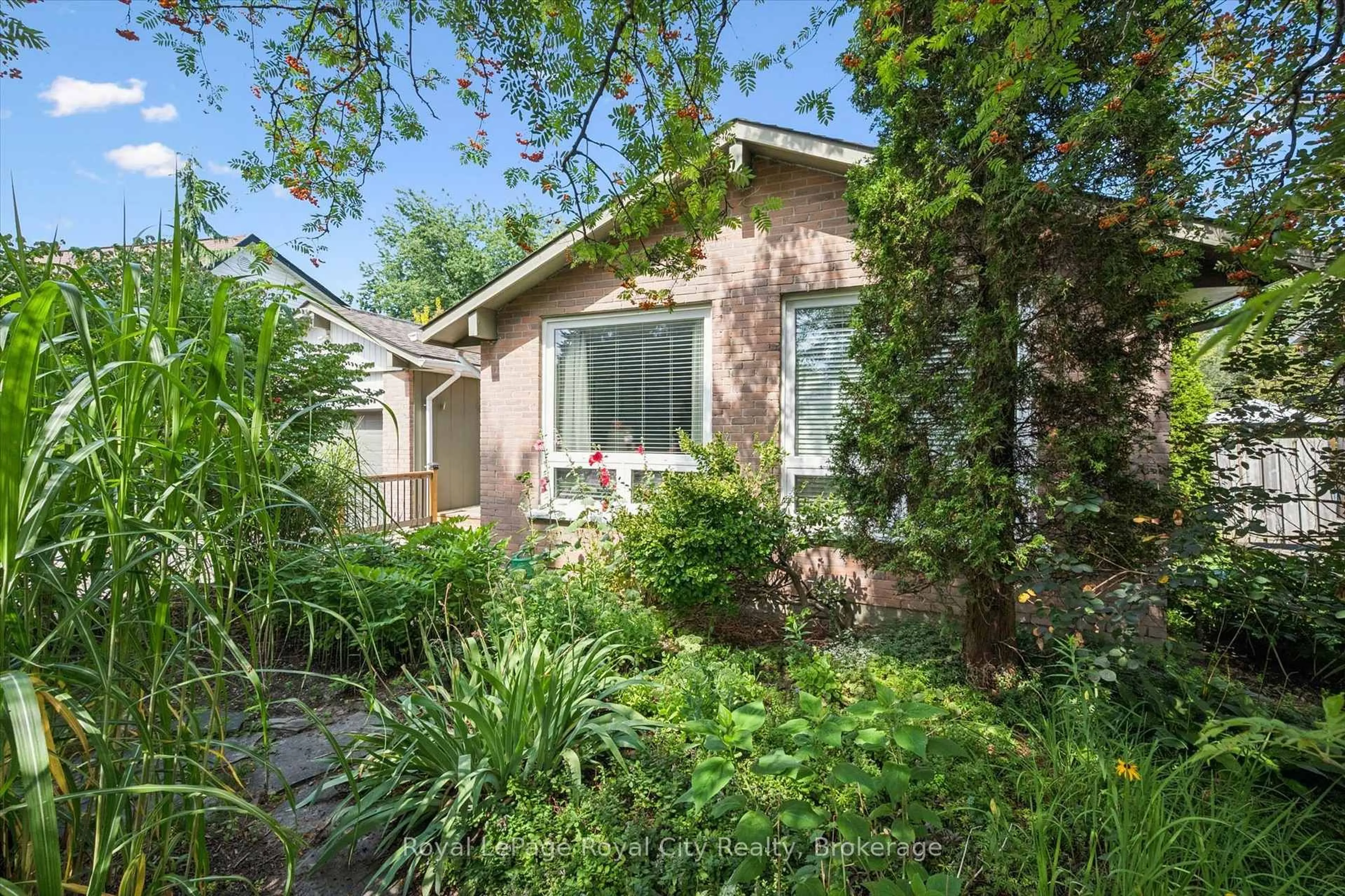Home with brick exterior material, street for 34 Pondview Cres, Guelph Ontario N1E 3K1