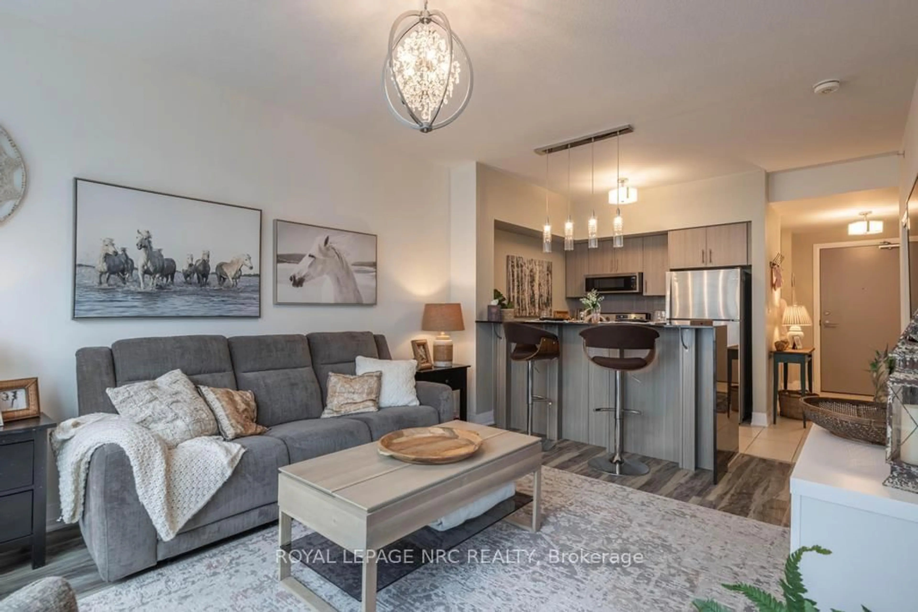 Living room with furniture, unknown for 10 Concord Pl #412, Grimsby Ontario L3M 0G6