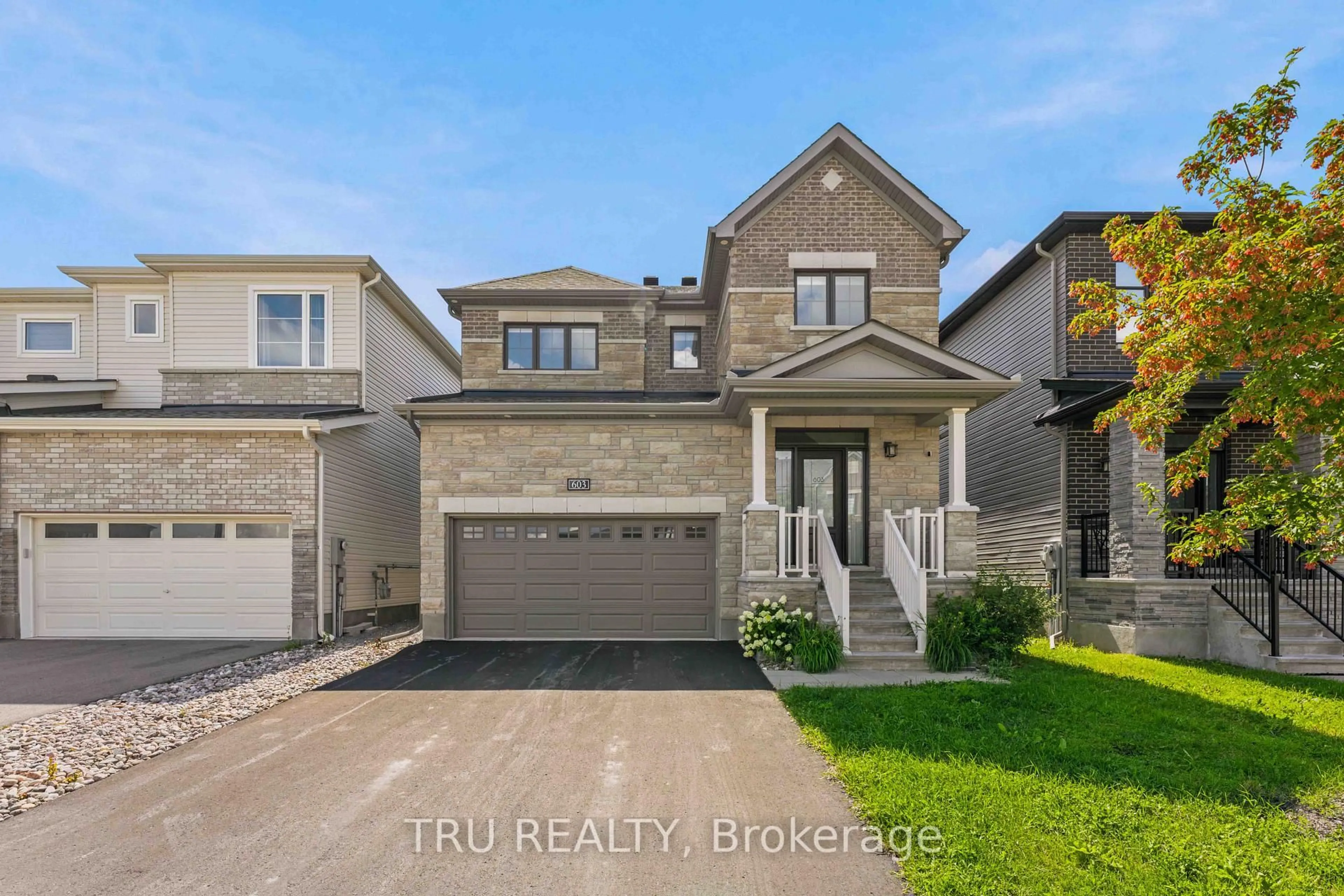 Home with brick exterior material, street for 603 Winterset Rd, Ottawa Ontario K2T 0R2