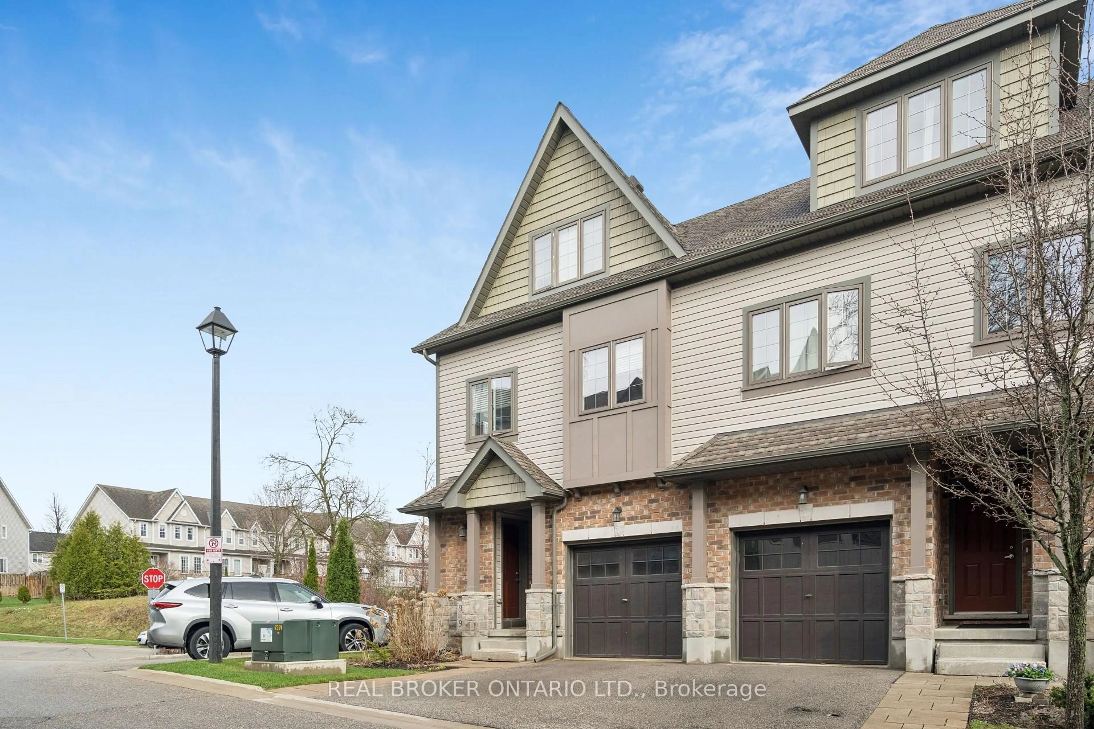 Home with brick exterior material, street for 9 Guthrie Lane #9B, Guelph/Eramosa Ontario N0B 2K0