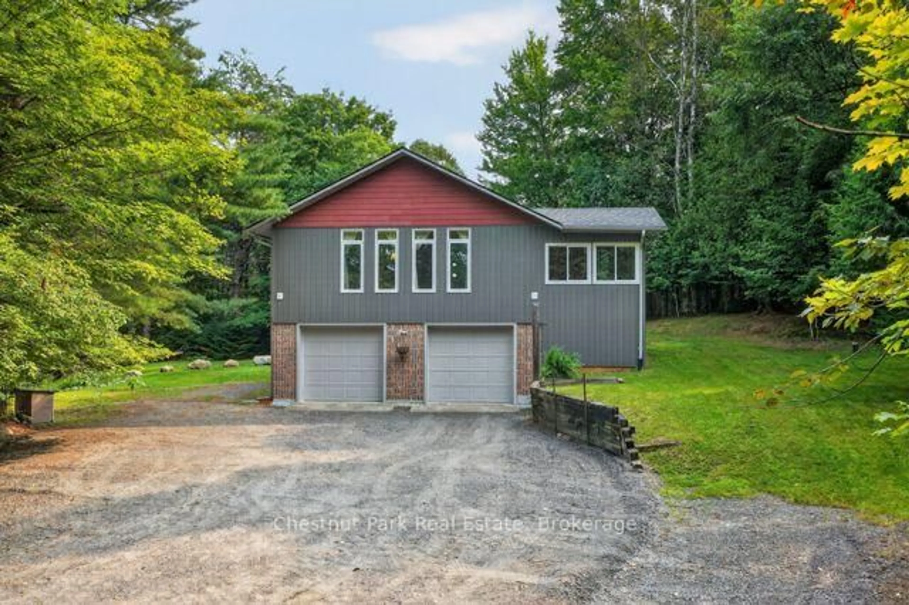 Home with vinyl exterior material, street for 1039 South Waseosa Lake Rd, Huntsville Ontario P1H 2N5