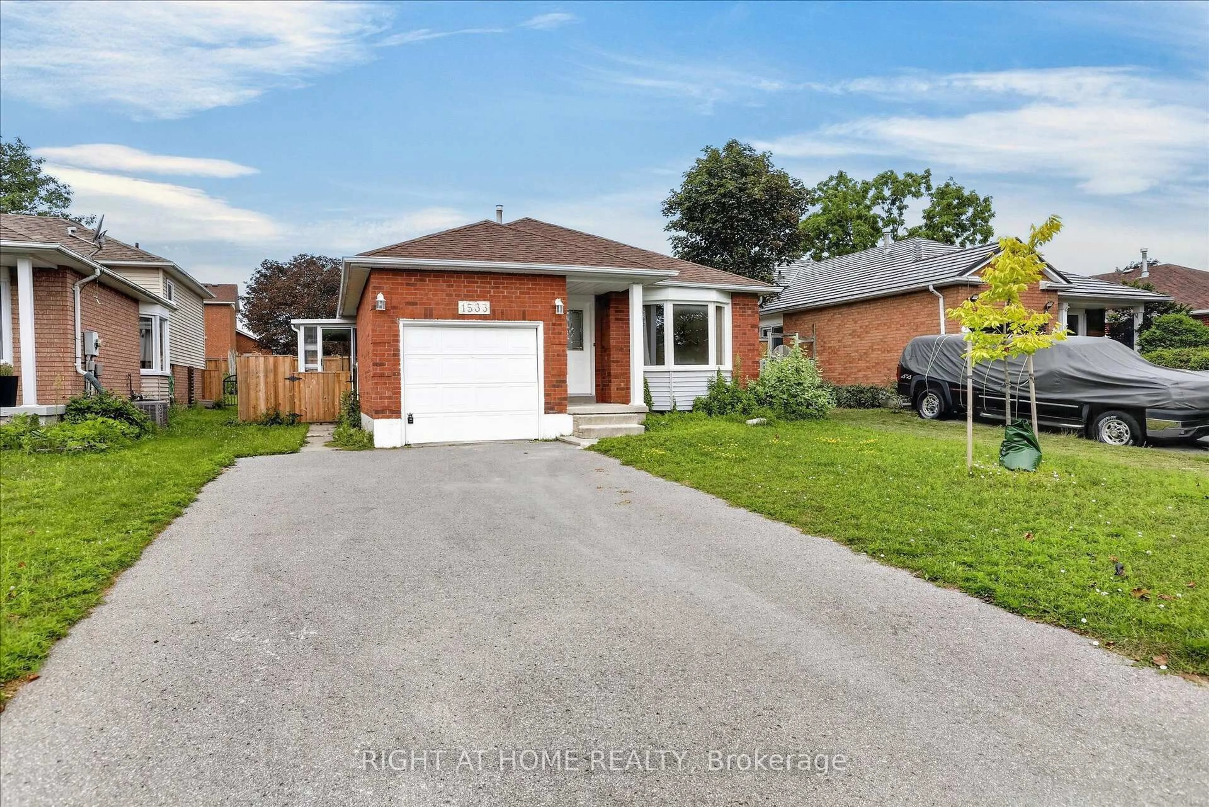 Home with brick exterior material, street for 1533 Wildlark Dr, Peterborough Ontario K9K 1X1