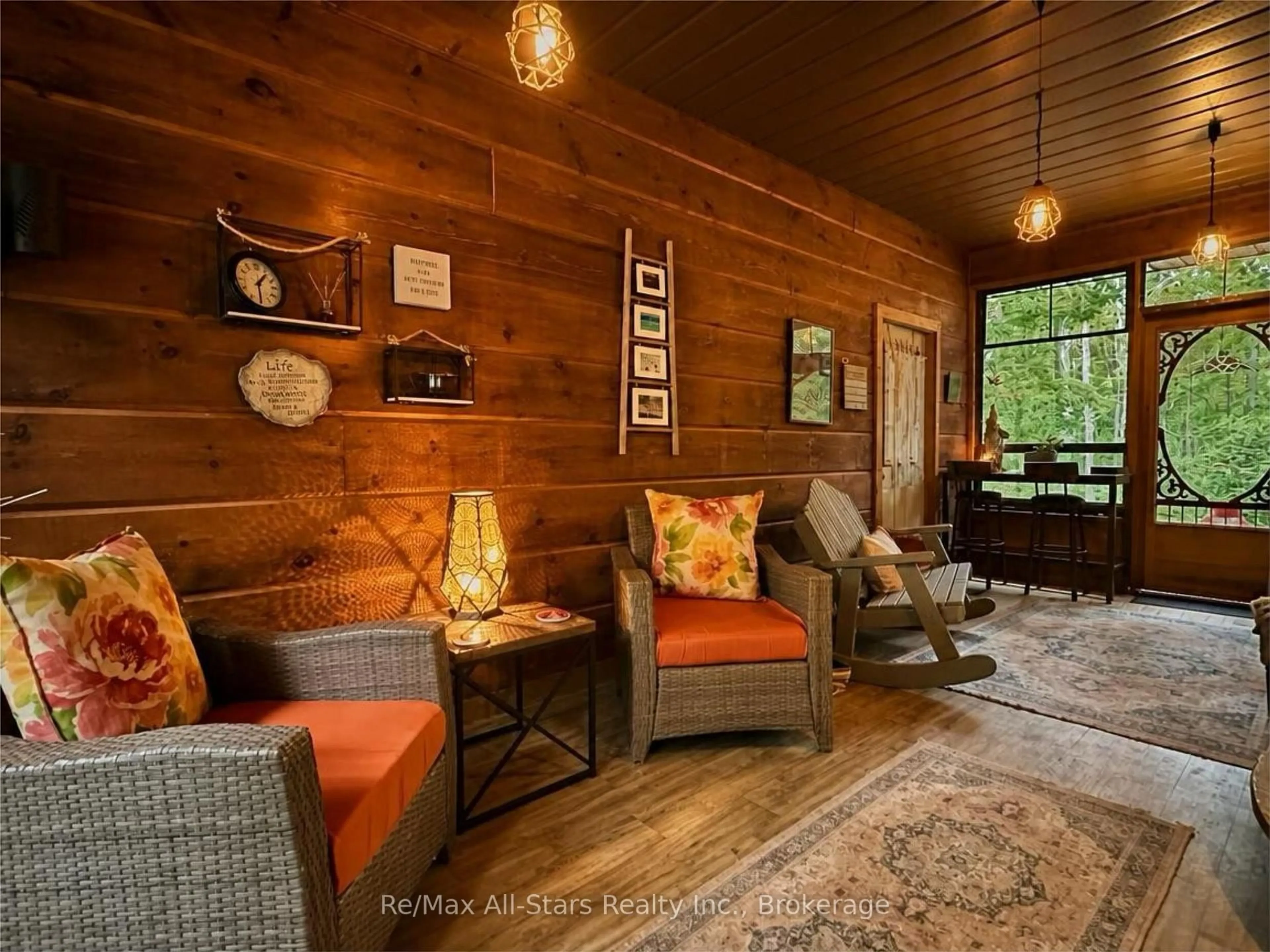 Living room with furniture, wood/laminate floor for 55 Golf Club Cres, Kawartha Lakes Ontario K0M 1N0