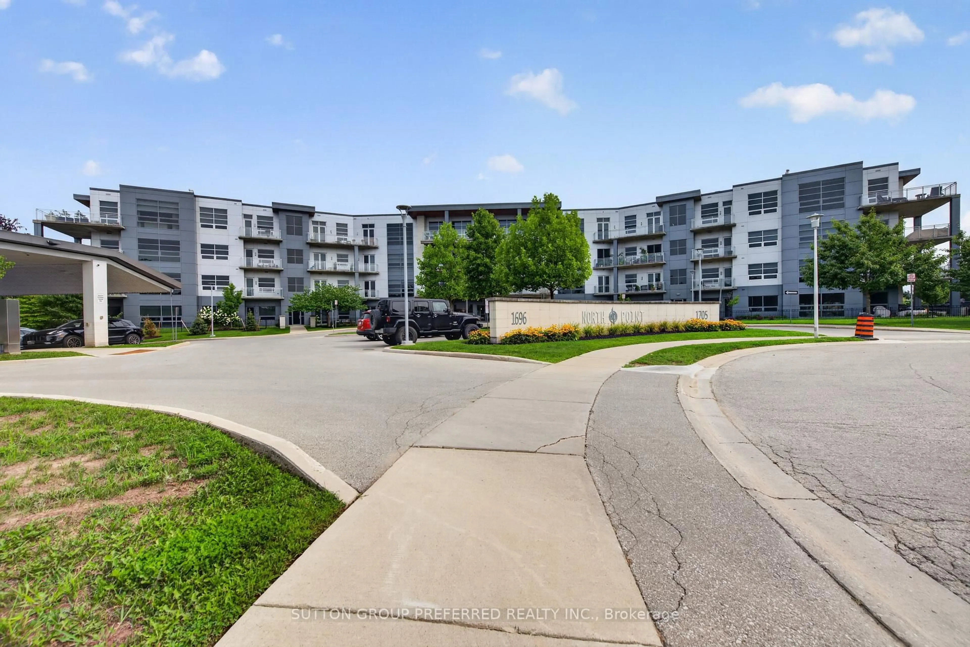 A pic from outside/outdoor area/front of a property/back of a property/a pic from drone, street for 1705 Fiddlehead Pl #311, London North Ontario N6G 0S1